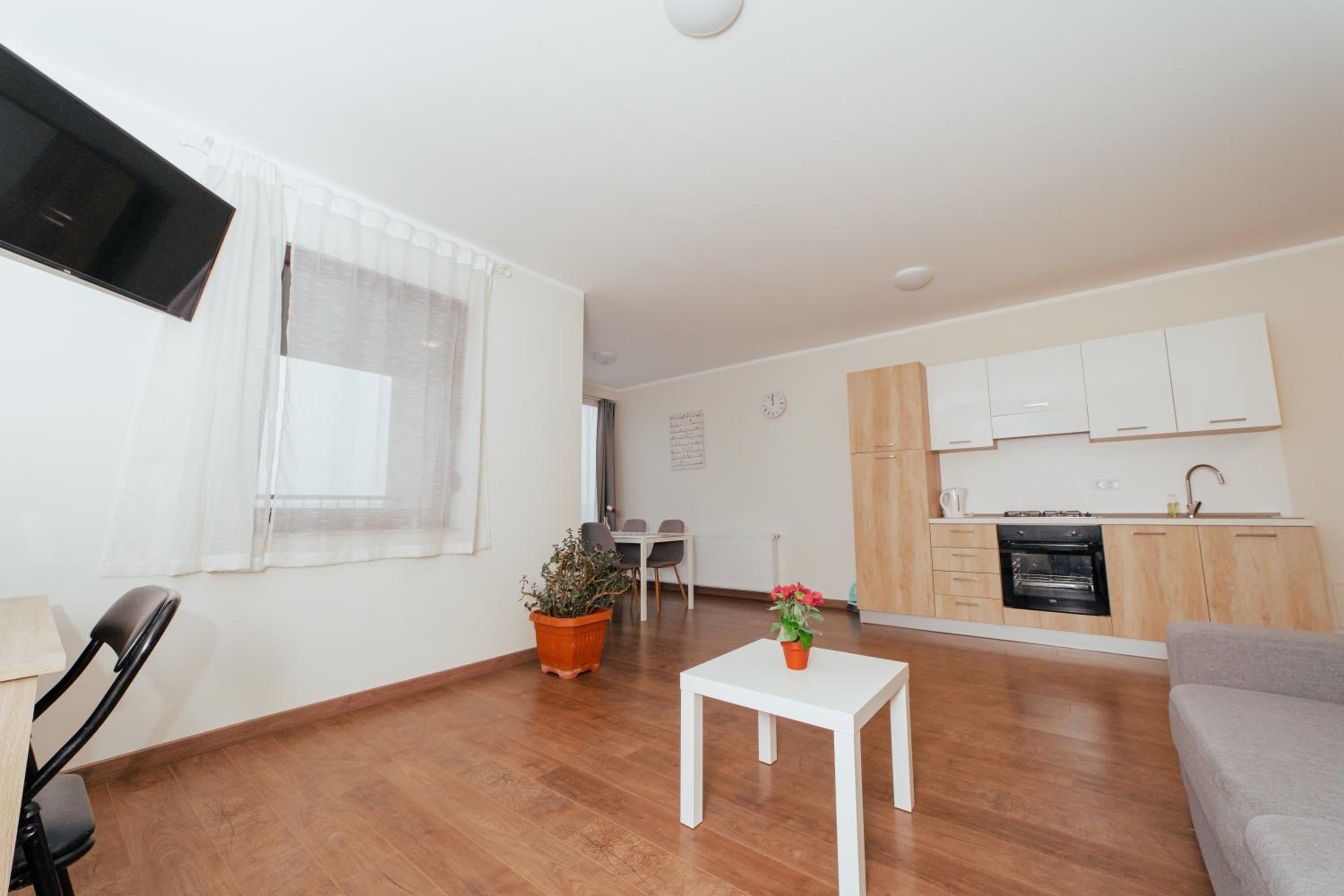 Apartment with Balcony - Photo 2