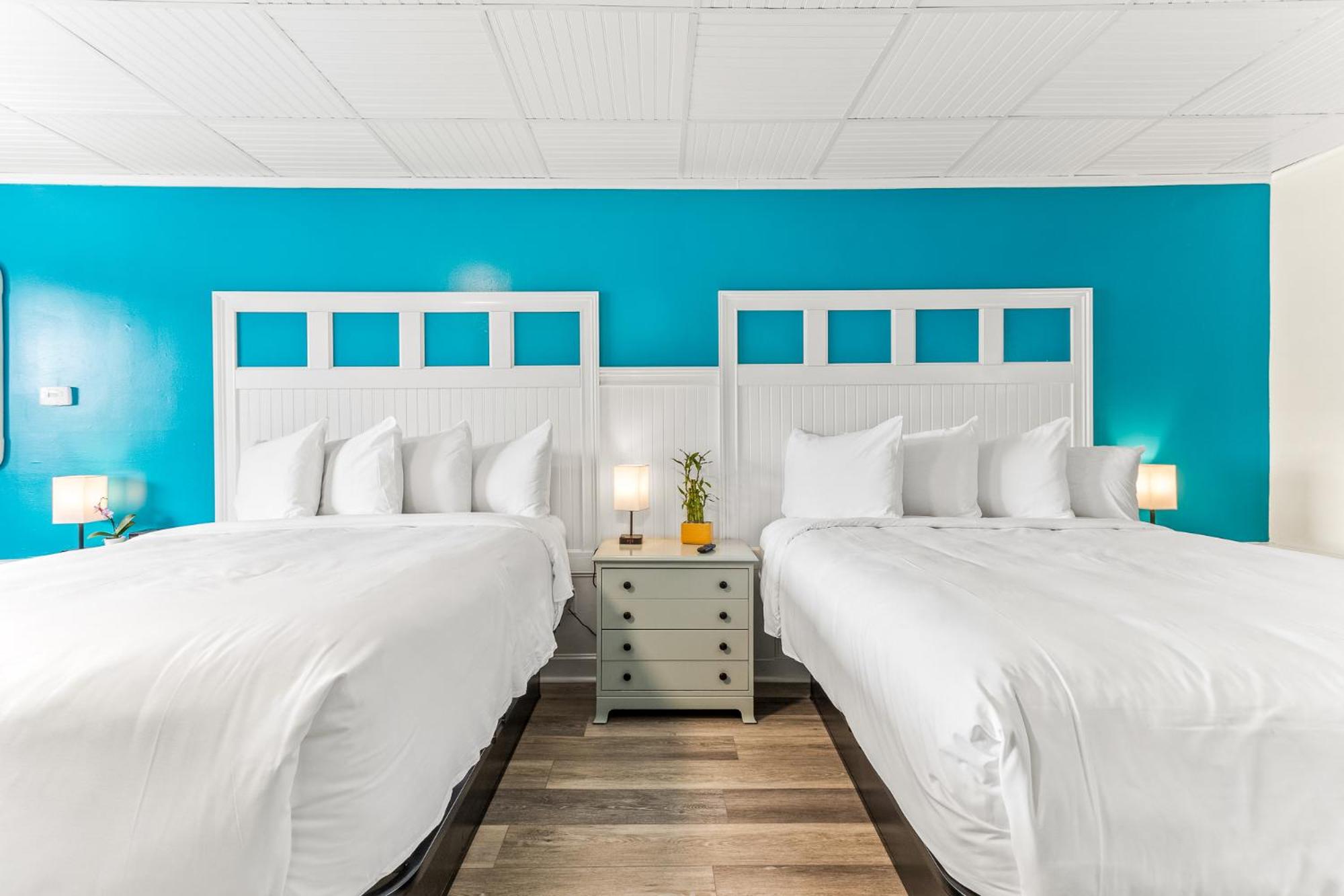 Superior Queen Room with Two Queen Beds - Photo 1