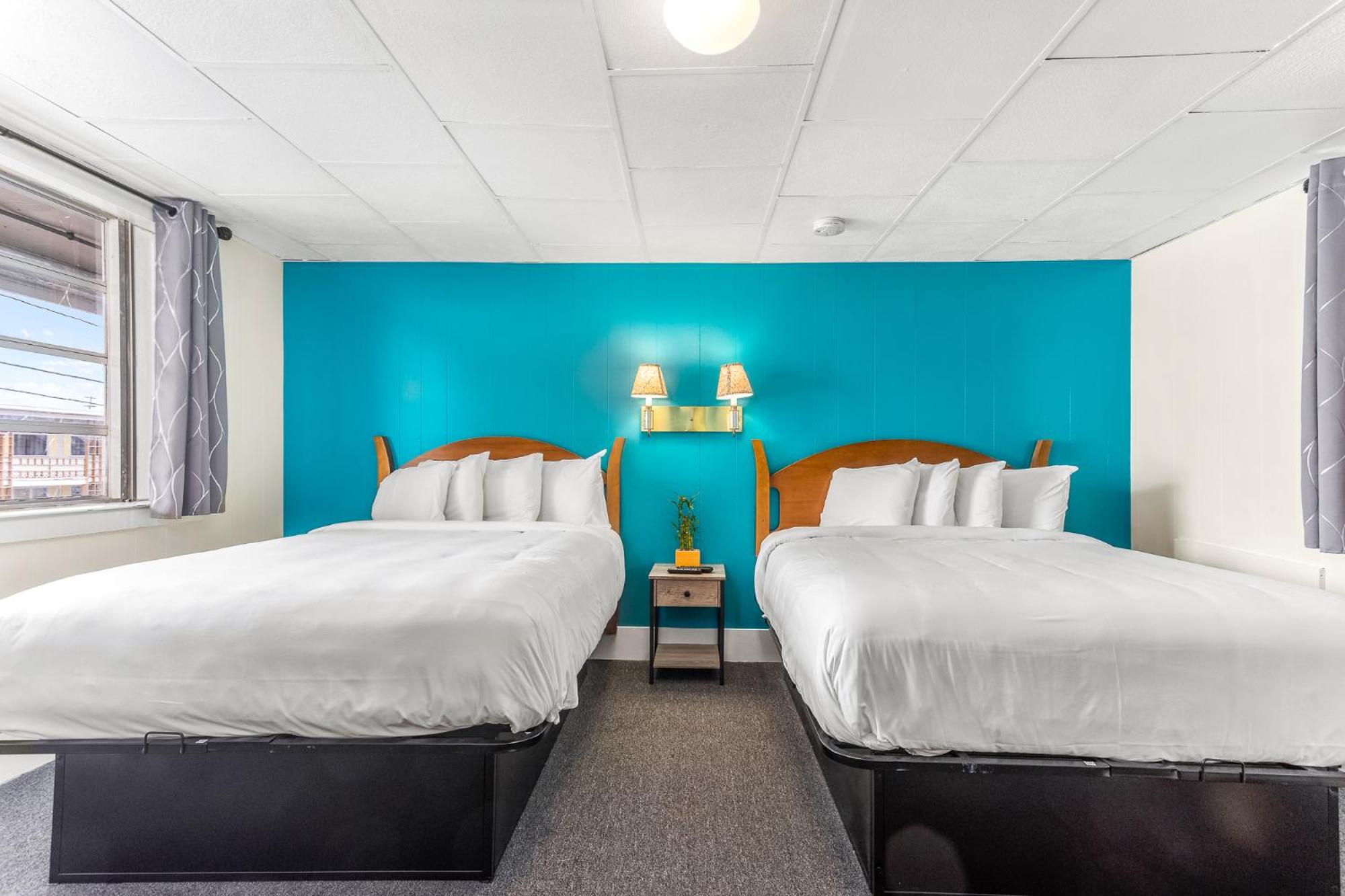 Standard Queen Room with Two Queen Beds - Photo 1