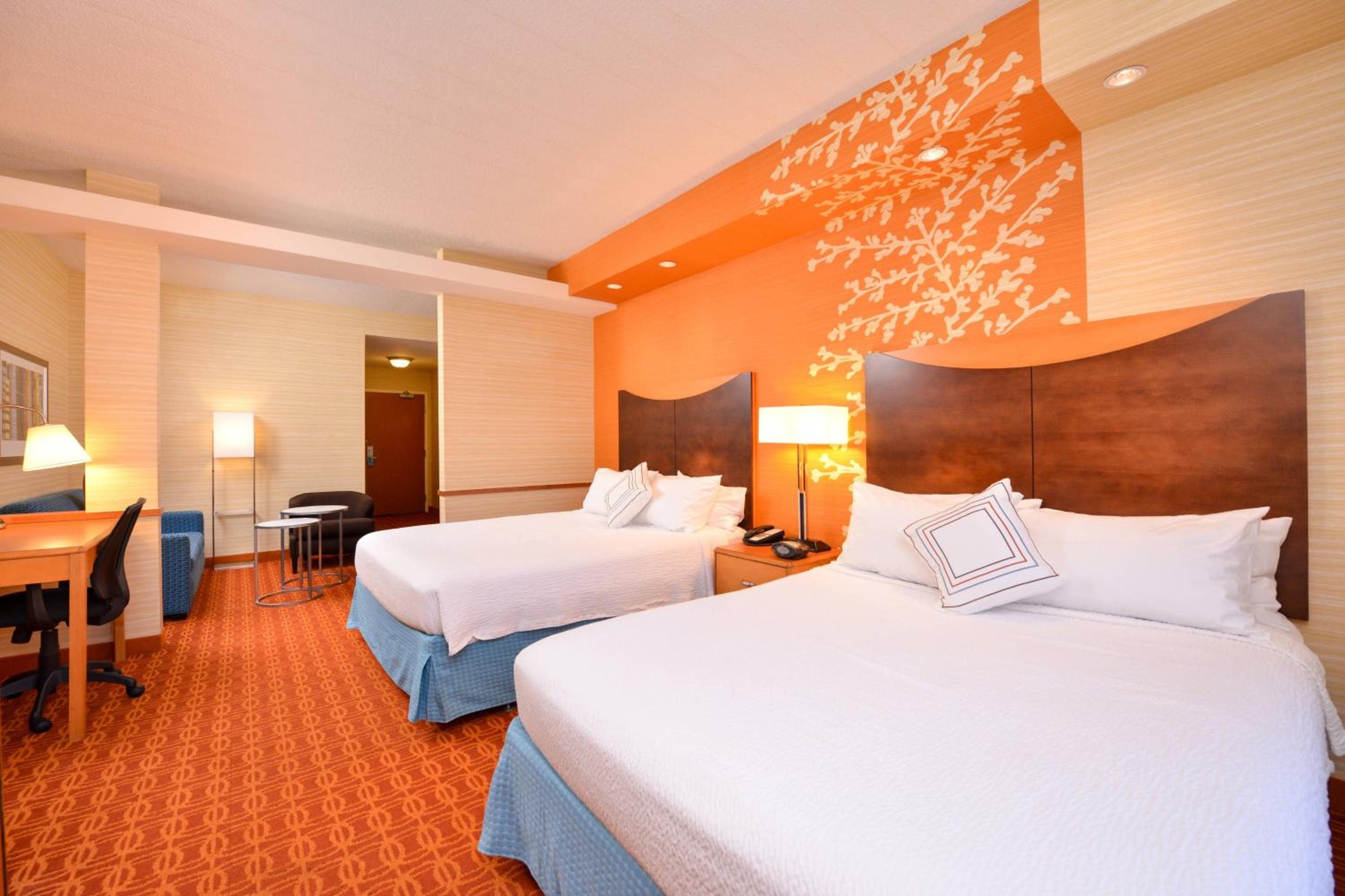 Queen Suite with Two Queen Beds, Sitting Area and Sofa Bed - Photo 1