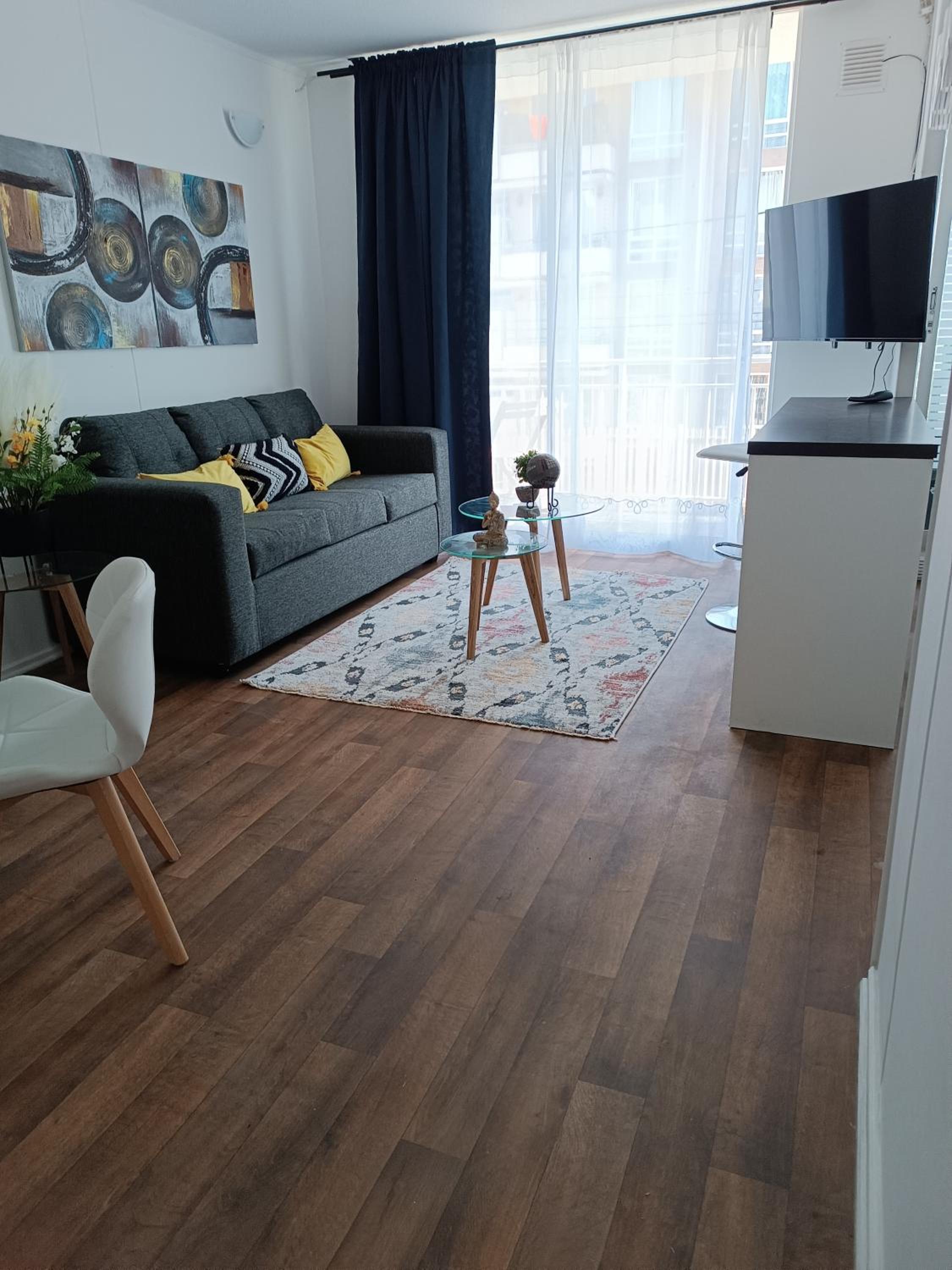 Three-Bedroom Apartment photo 1