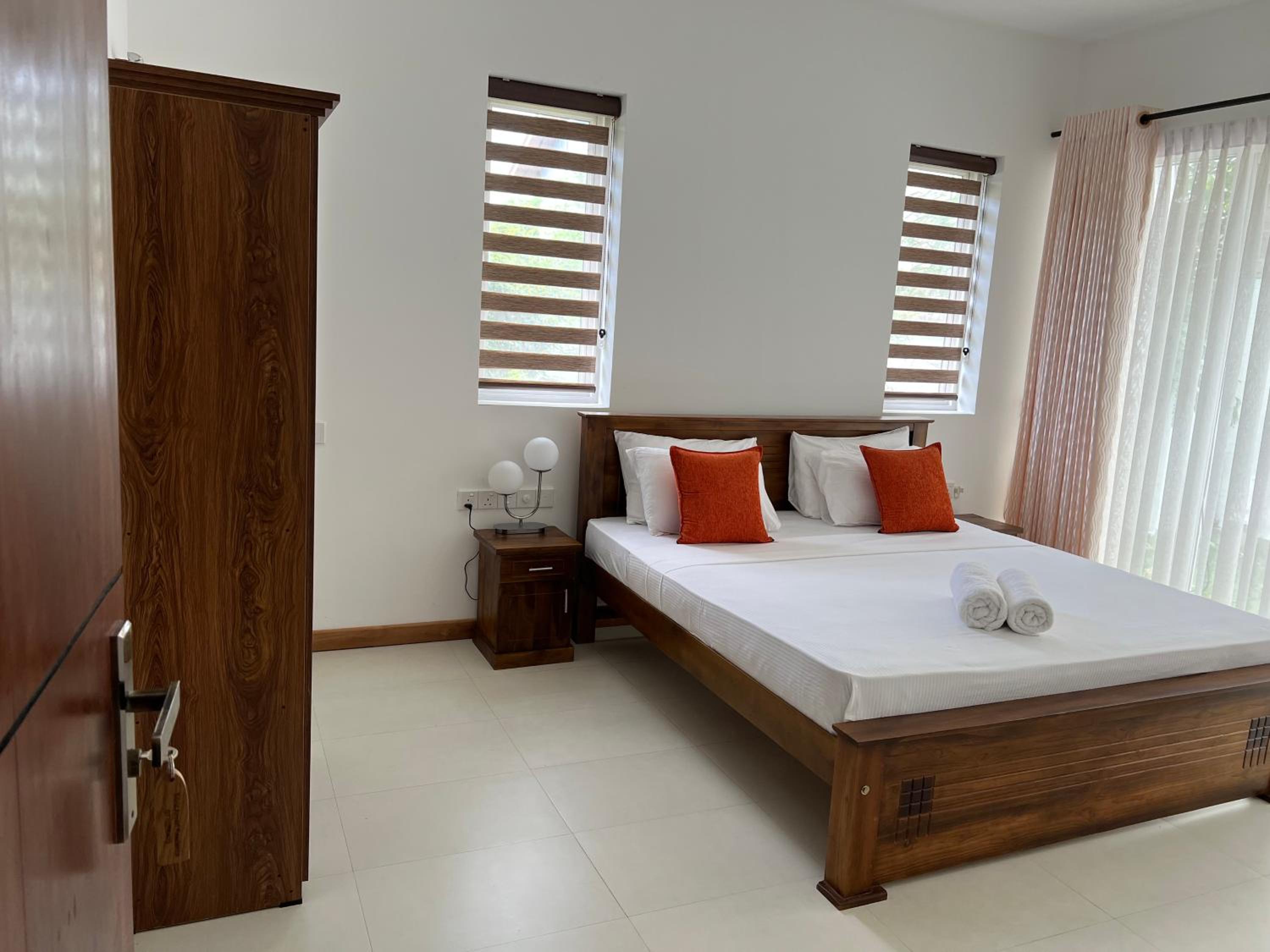 Deluxe Double Room (2 Adults + 1 Child) photo 2