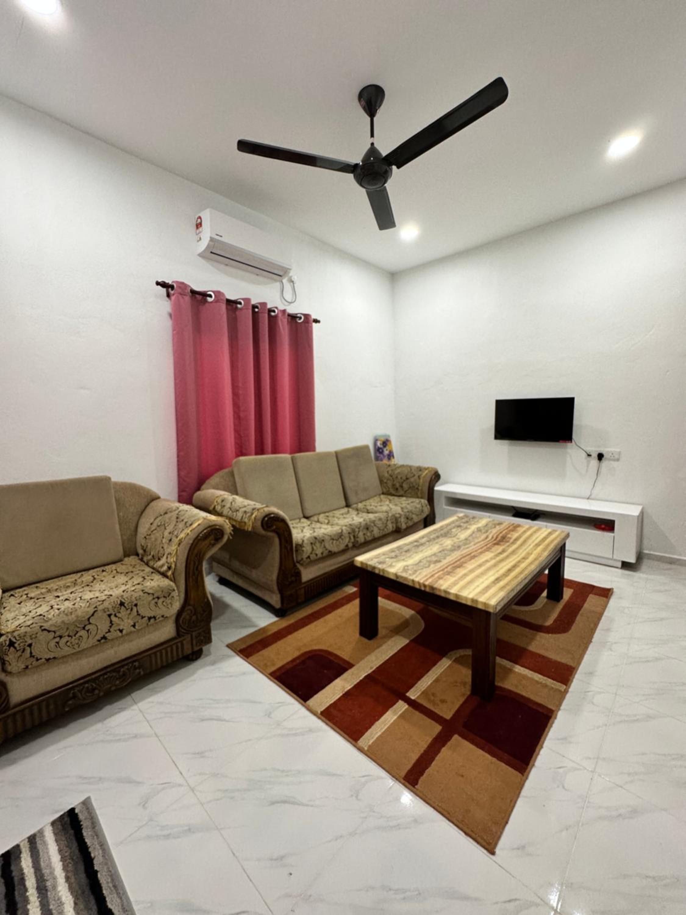 Three-Bedroom Apartment photo 1