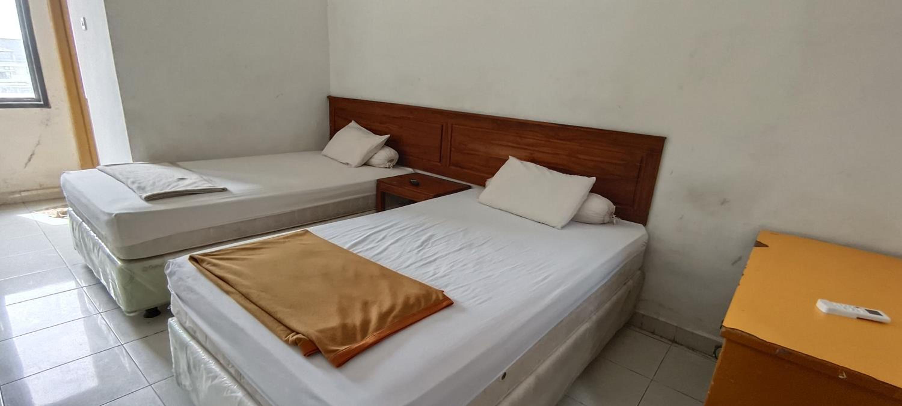 Standard Twin Room - Photo 11