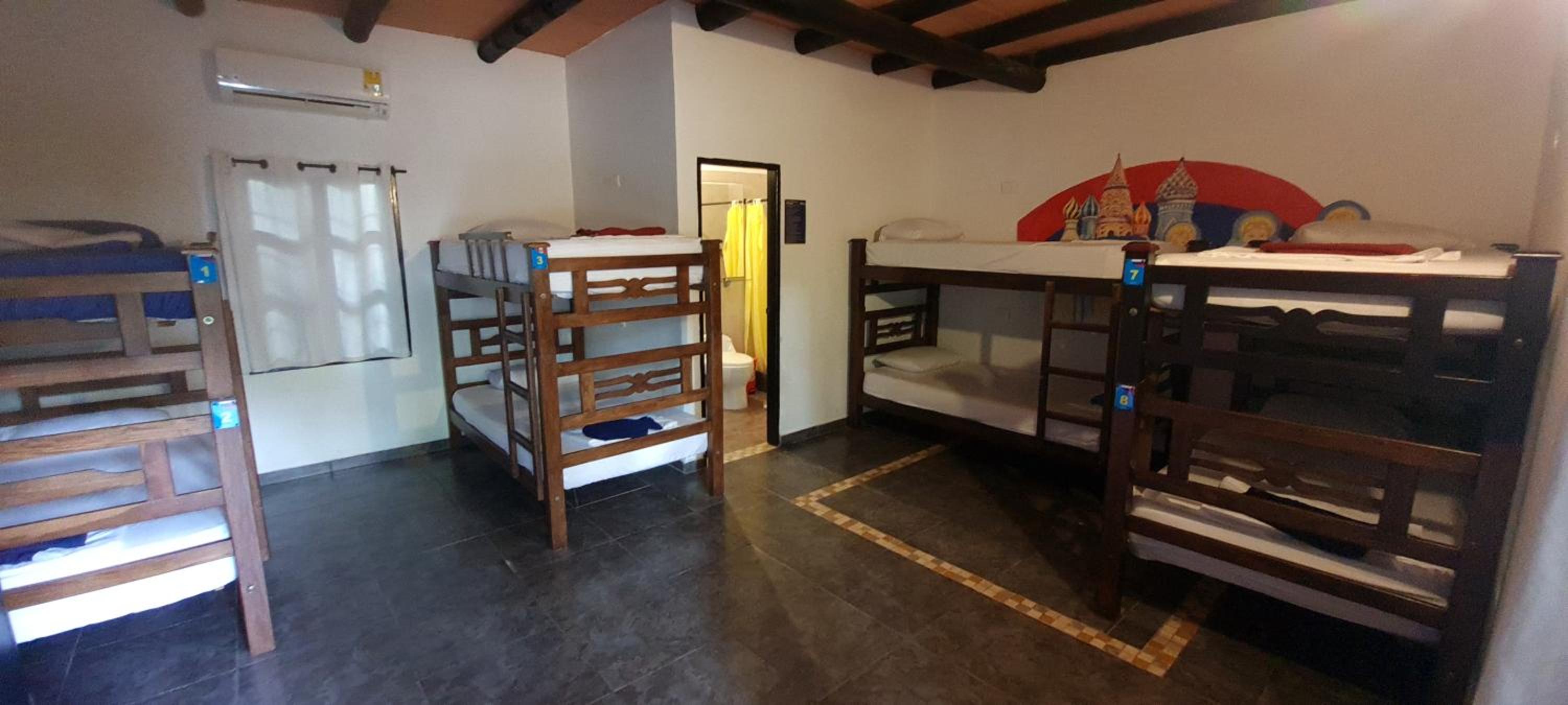 Bed in 8-Bed Mixed Dormitory Room with Air Conditioning photo 1