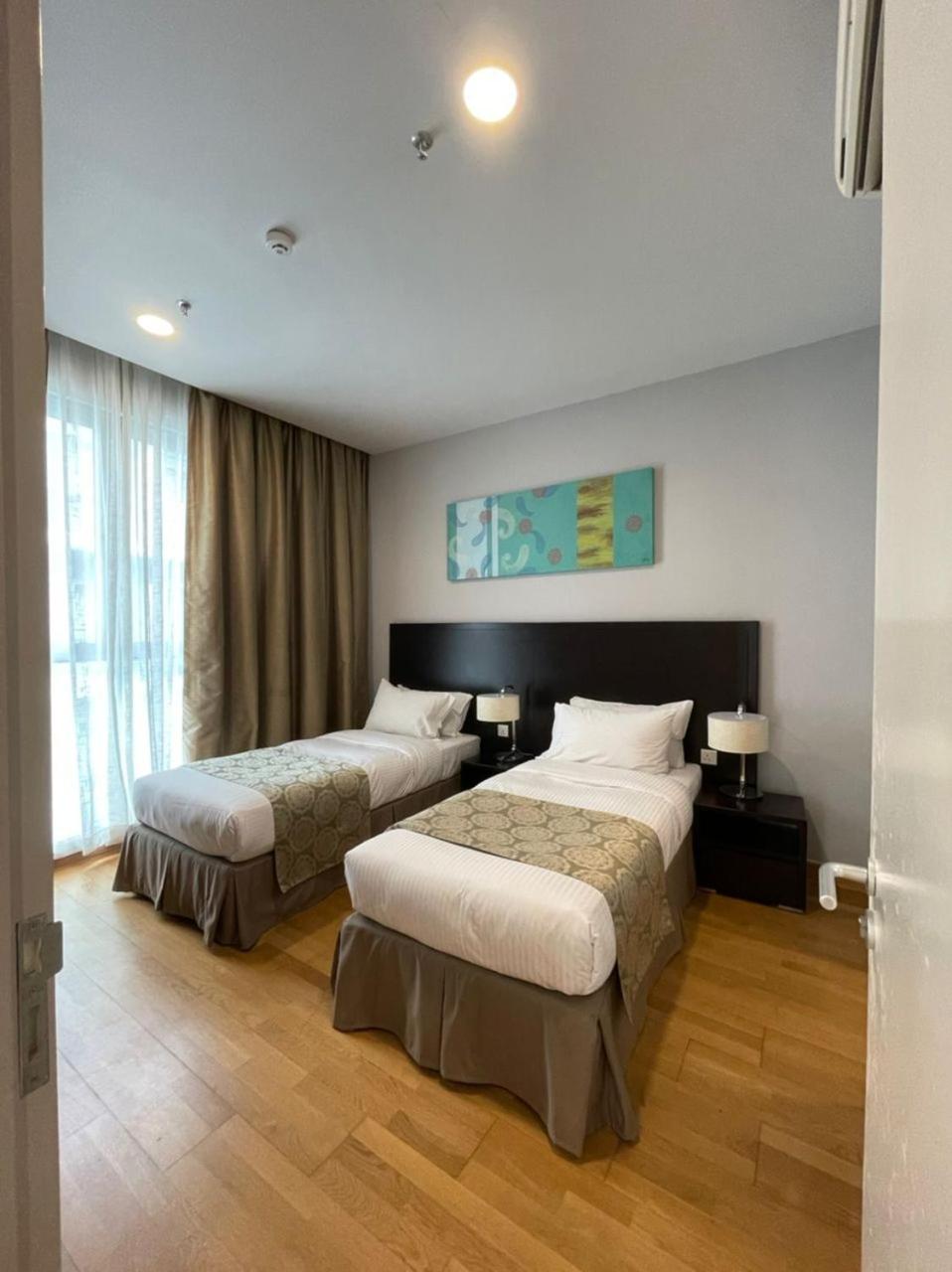 Two-Bedroom Executive Suite with One King Bed and Two Single Beds, Non-Smoking