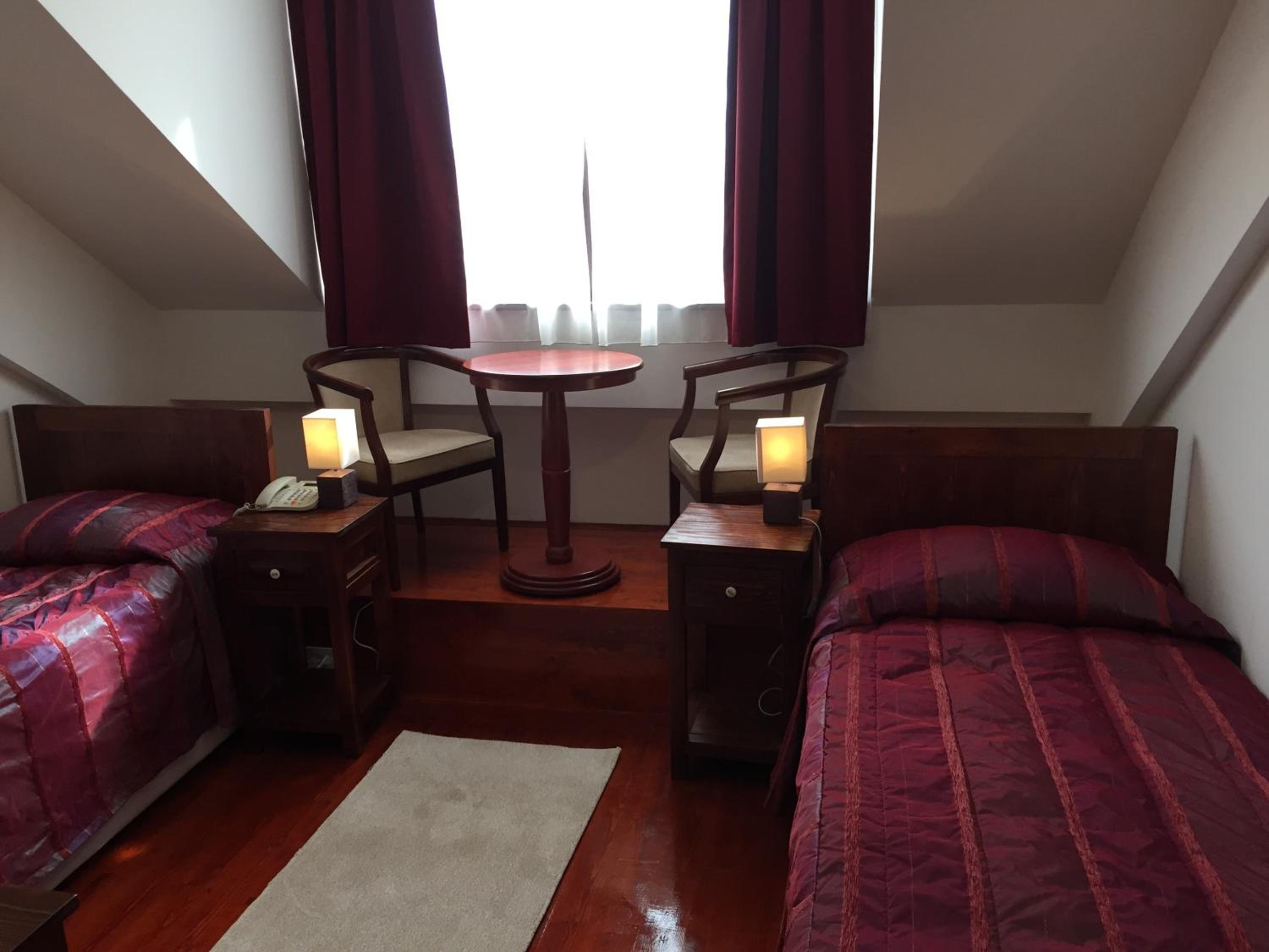 Twin Room - Photo 1