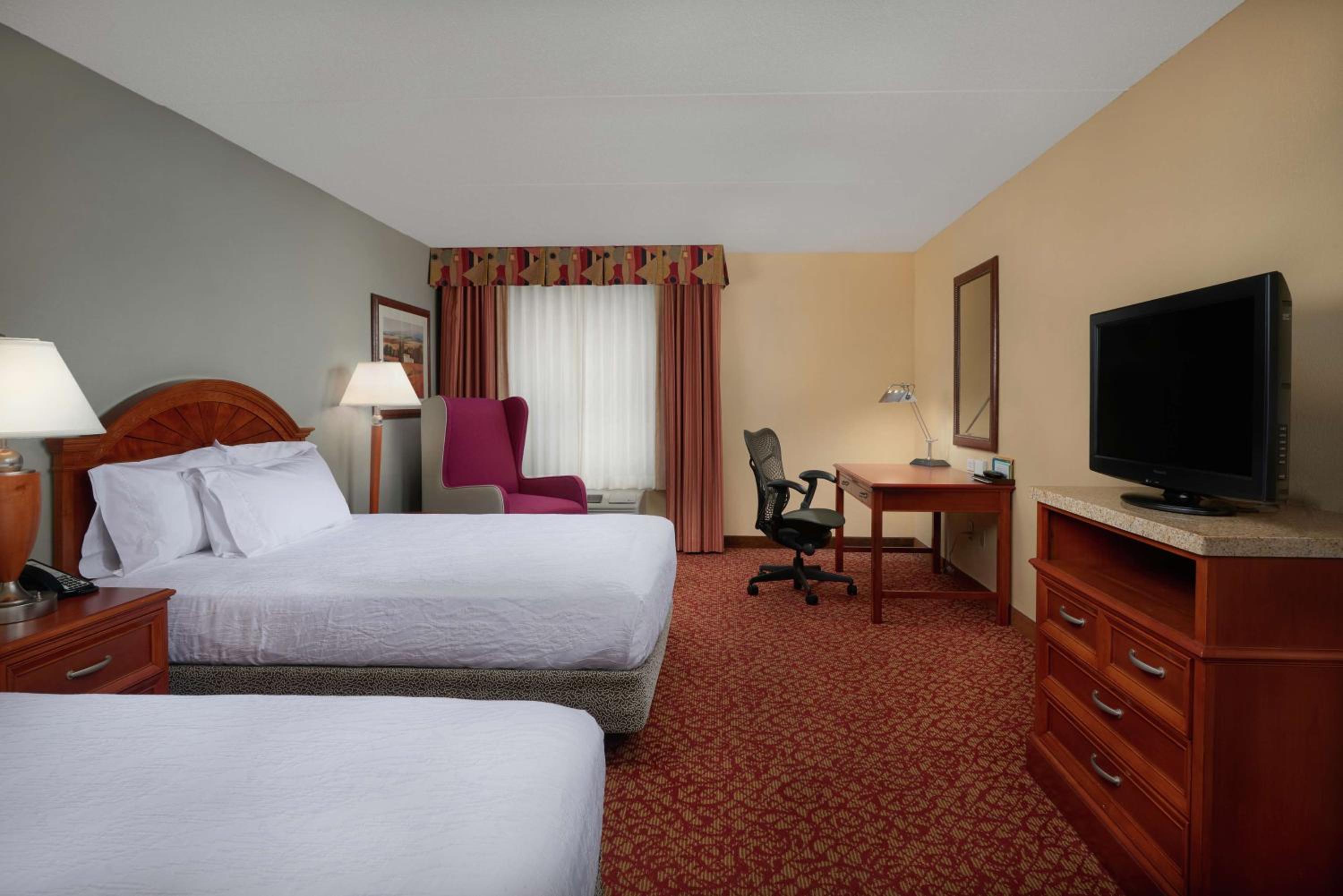Queen Room with Two Queen Beds - Photo 1