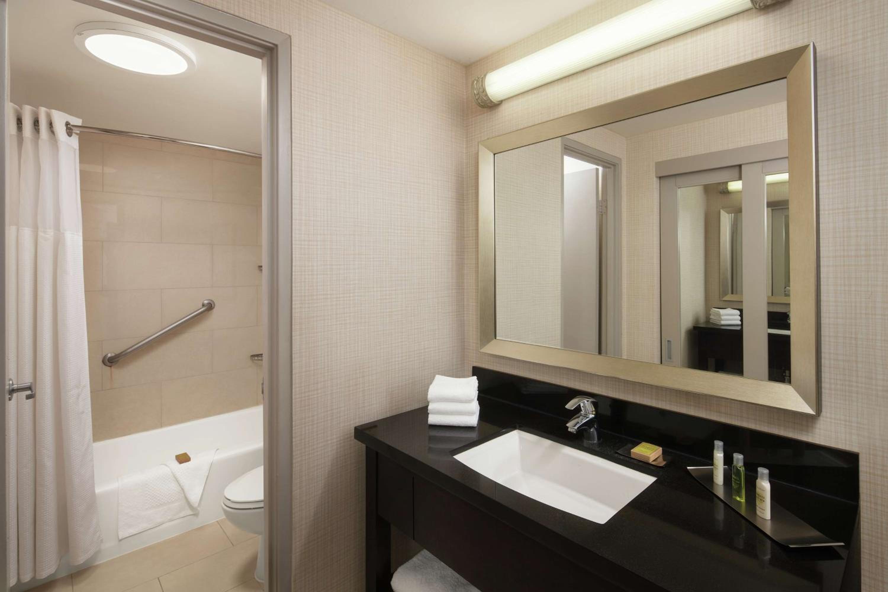 Queen Room with Two Queen Beds with Balcony and Pool View
