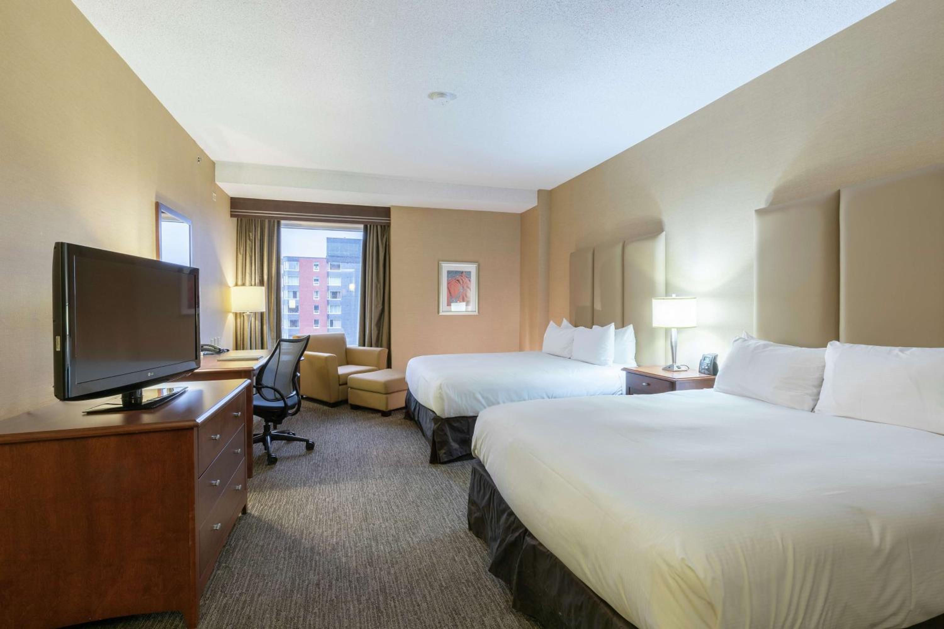 Queen Room with Two Queen Beds and City View - Photo 1