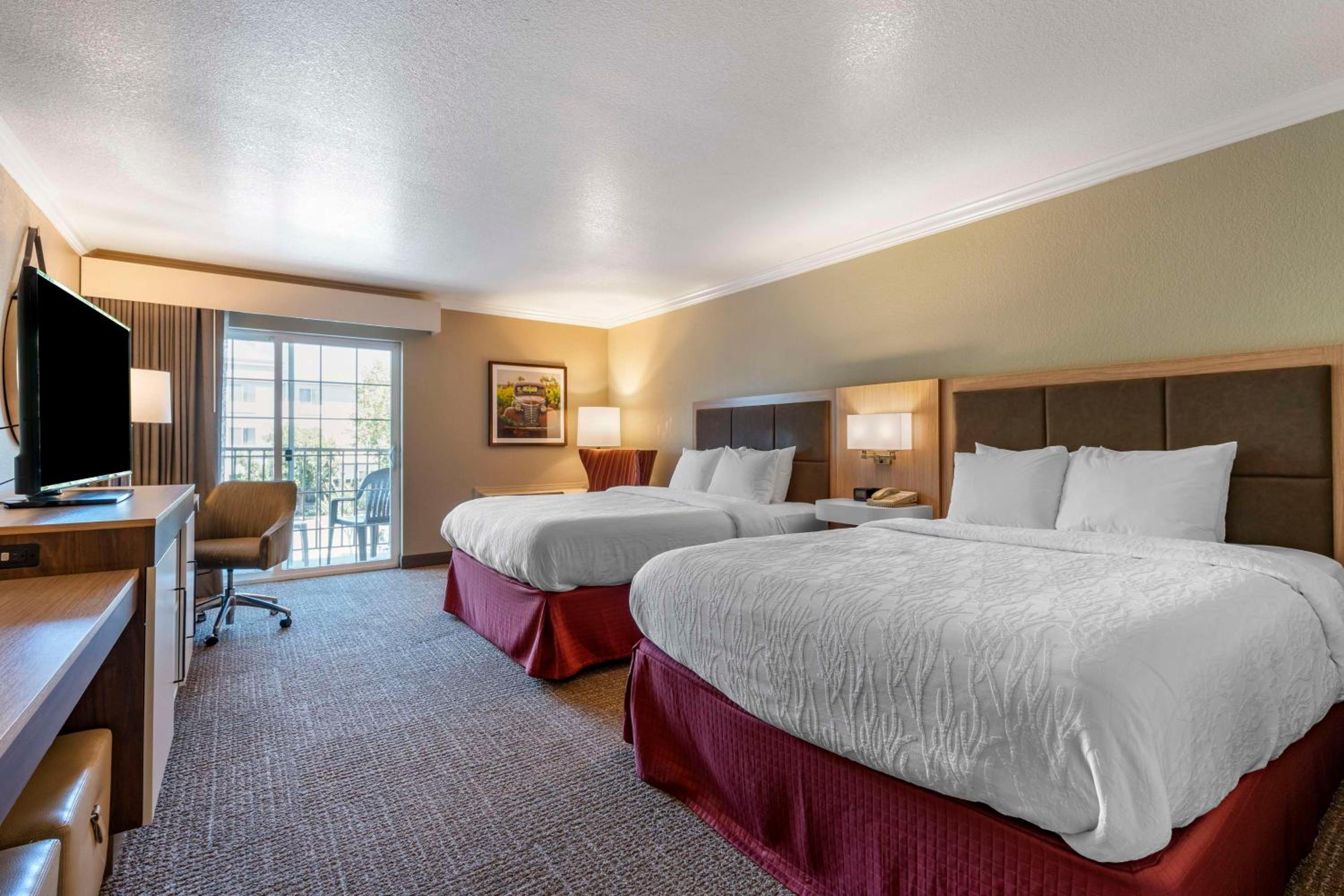Queen Room with Two Queen Beds and Balcony - Non-Smoking - Photo 1
