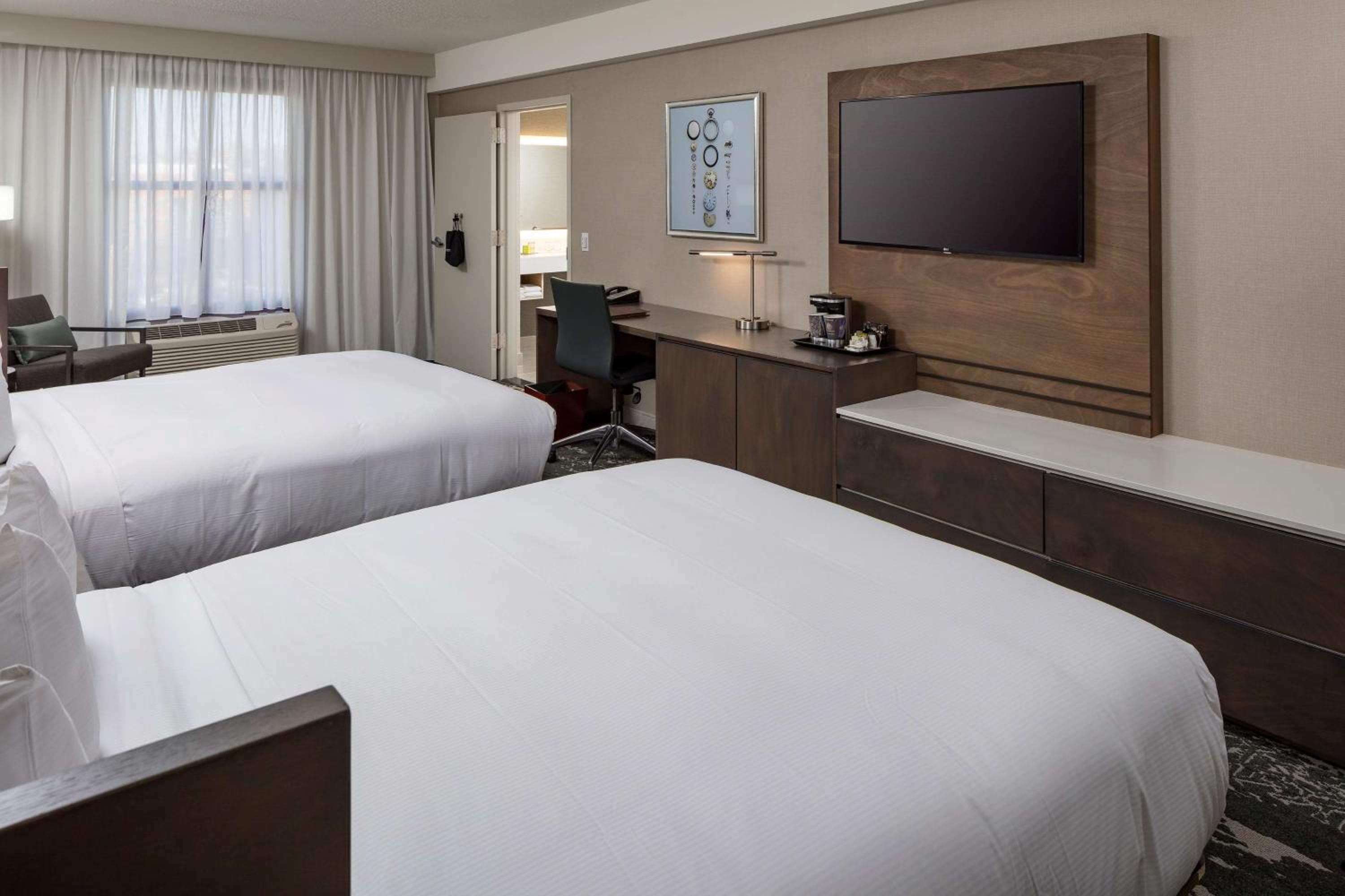 Queen Room with Two Queen Beds and Roll-In Shower at DoubleTree by Hilton Boston Logan Airport Chelsea in Chelsea