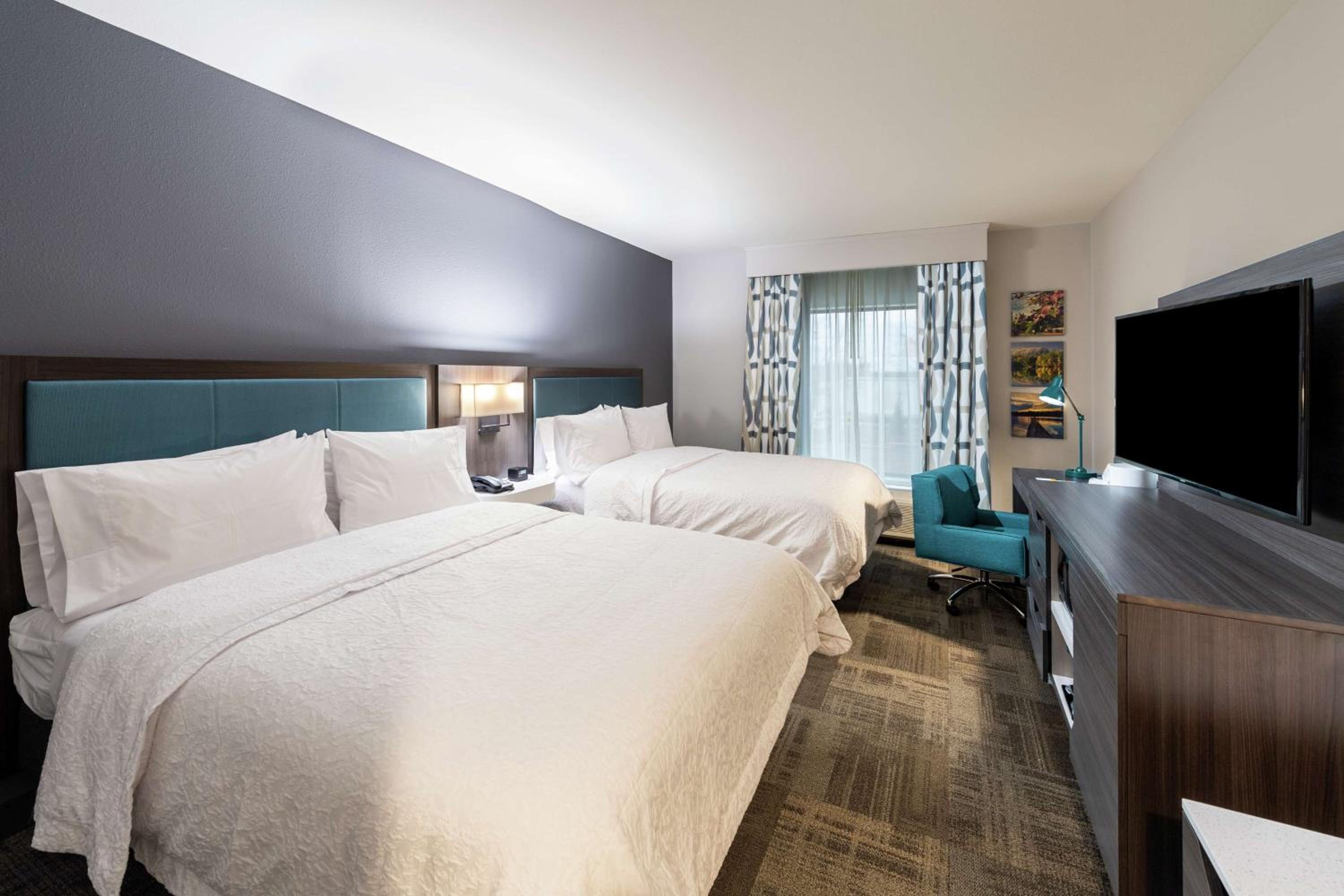 Queen Room with Two Queen Beds - Photo 1