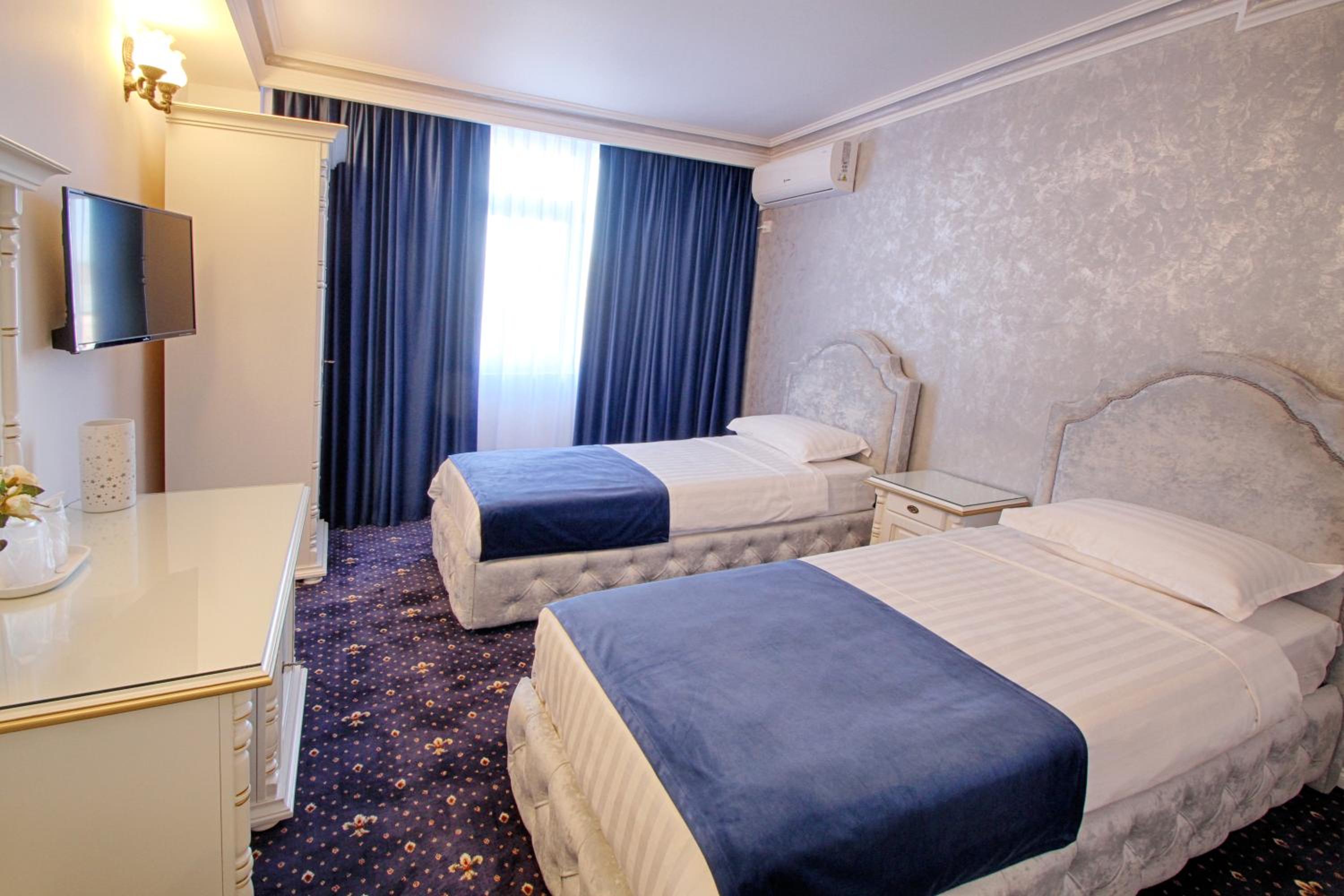 Twin Room - Photo 3