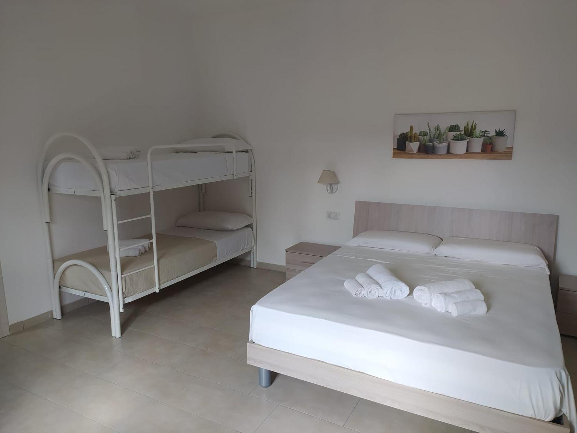 Standard Quadruple Room - Photo 4