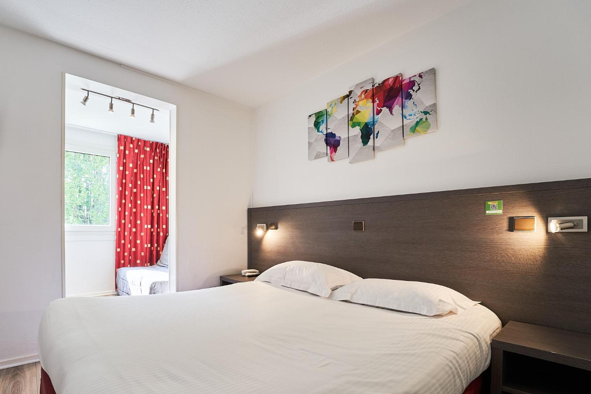 Quadruple Room with 1 Double Bed and 1 sofa bed photo 1