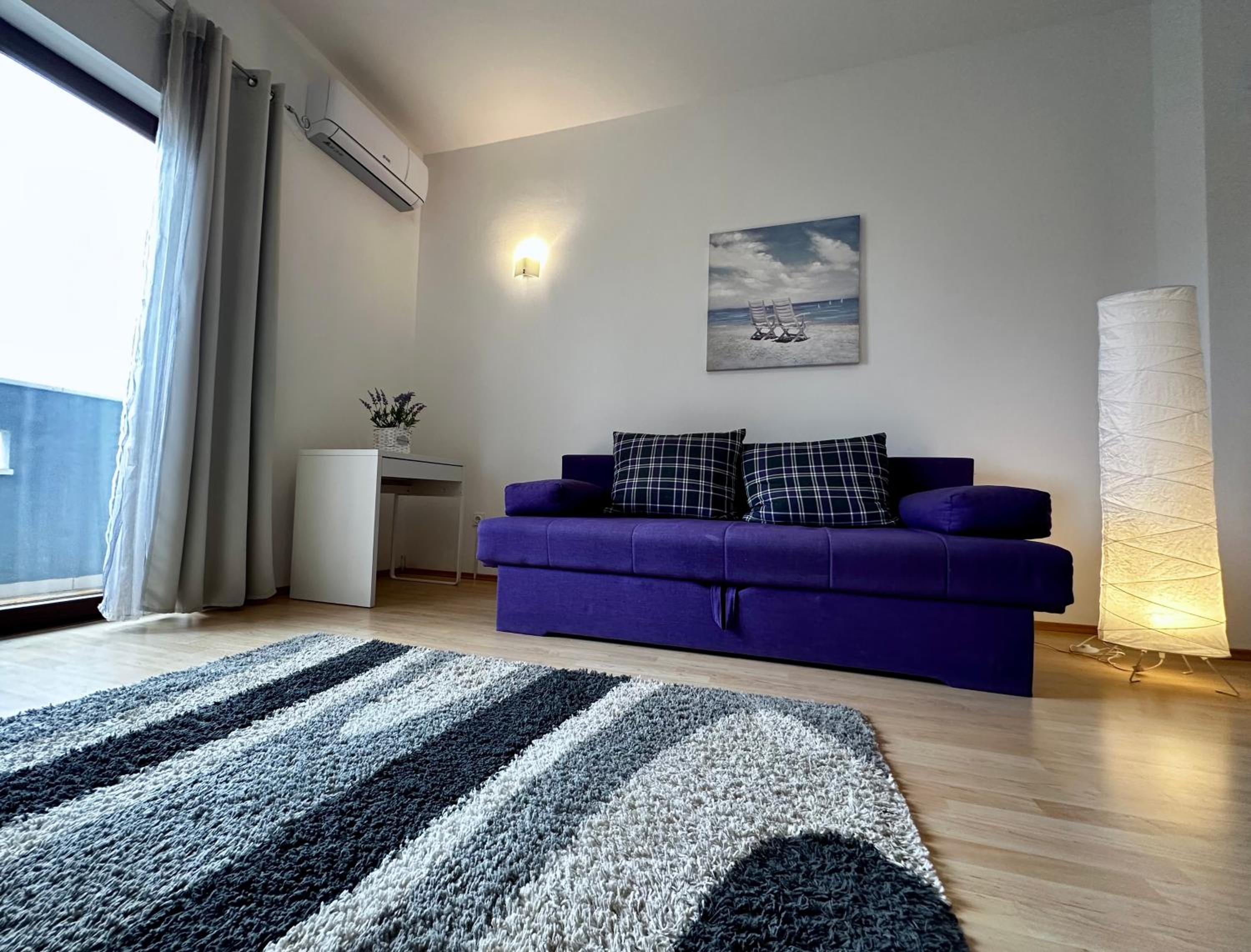 One-Bedroom Apartment with Balcony and Sea View