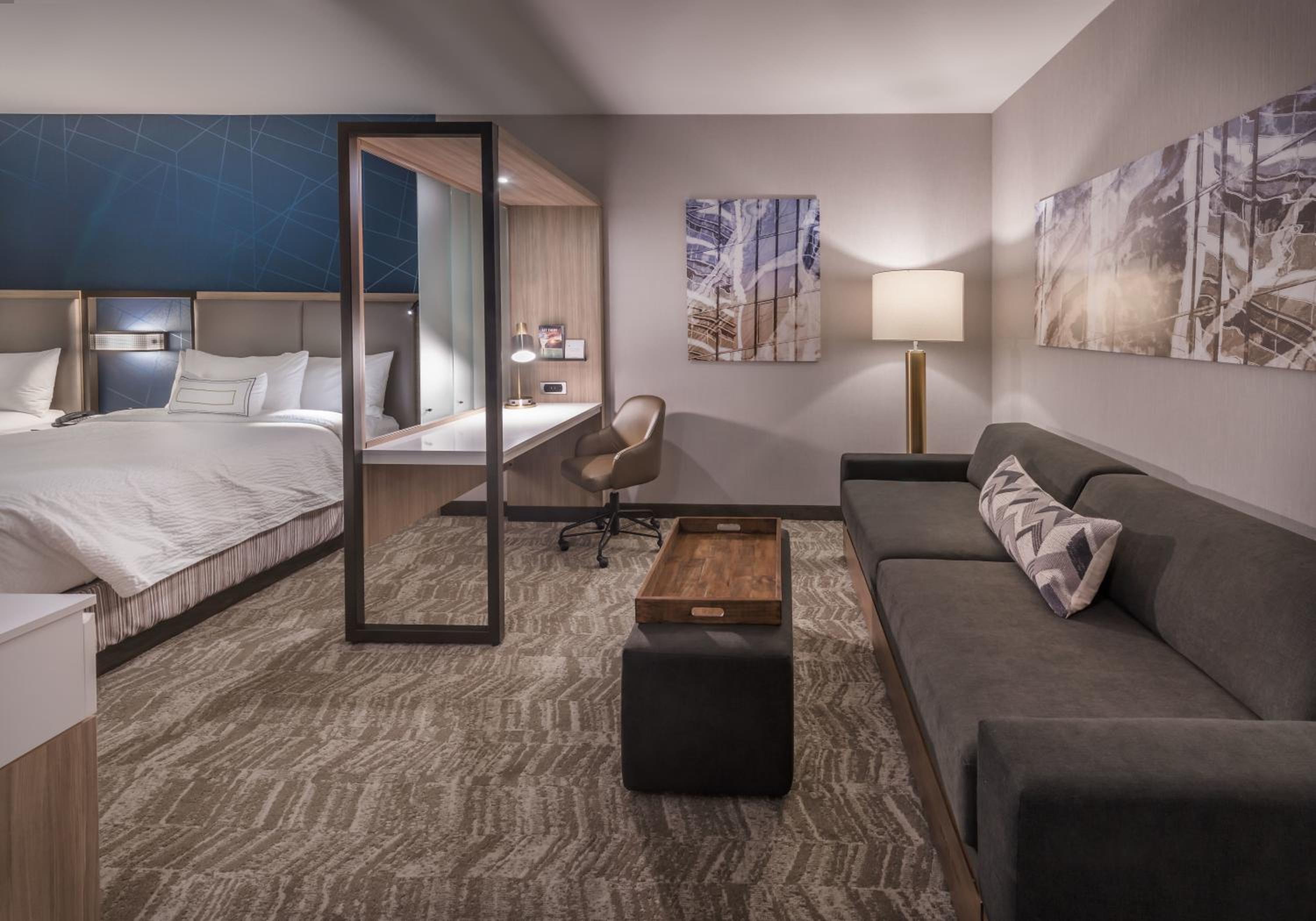 Queen Suite with Two Queen Beds and Trundle Sofa - Hearing Accessible photo 1