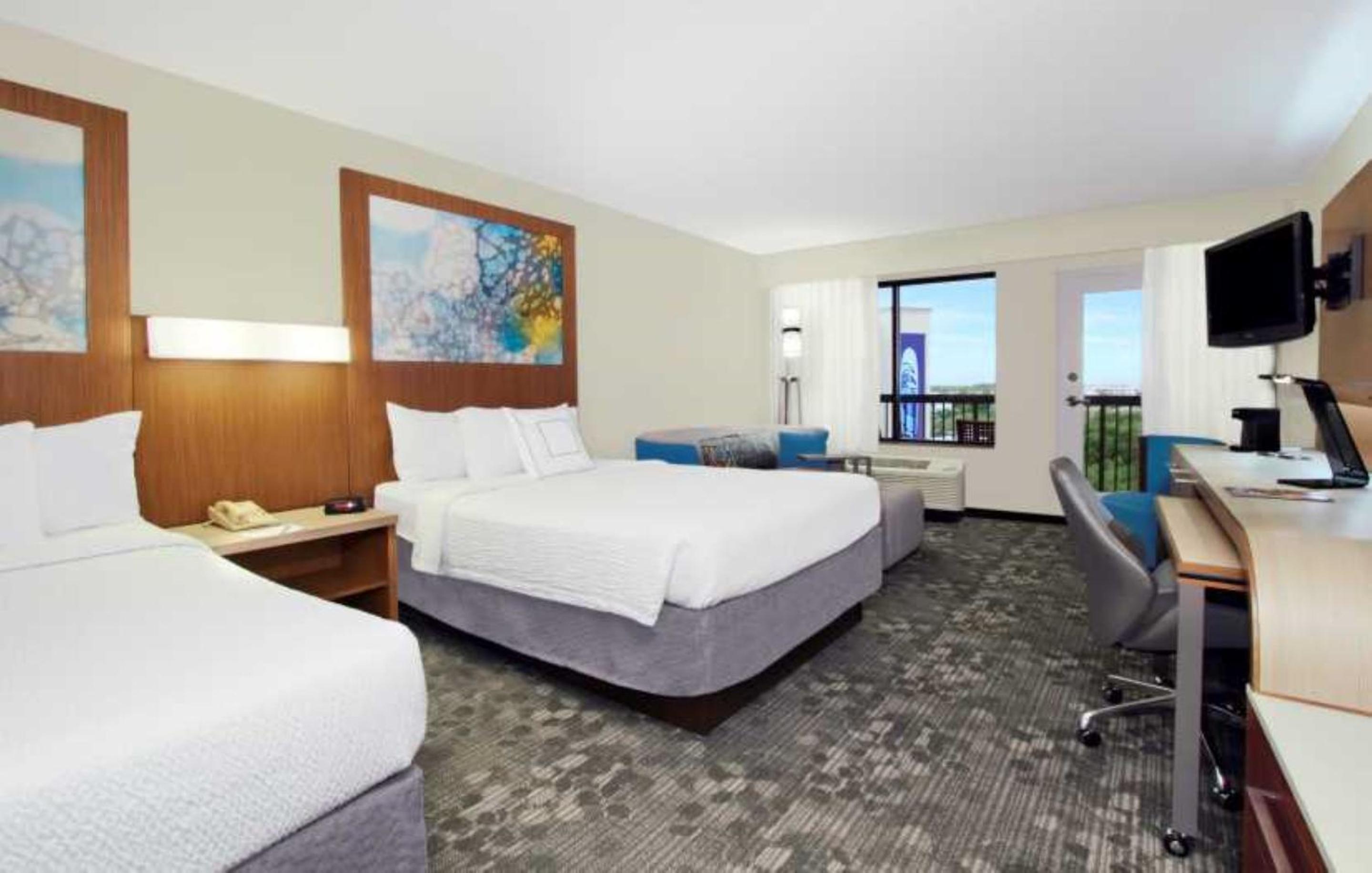 Queen Room with Two Queen Beds with Adapted Tub and Balcony - Mobility and Hearing Accessible - Photo 1