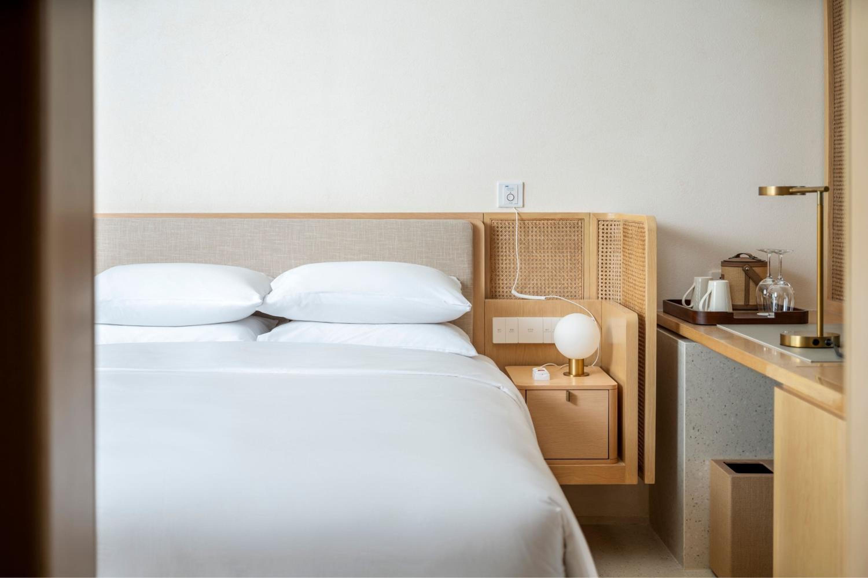 Elderly Deluxe Queen Room with Two Queen Beds and Balcony - Photo 7