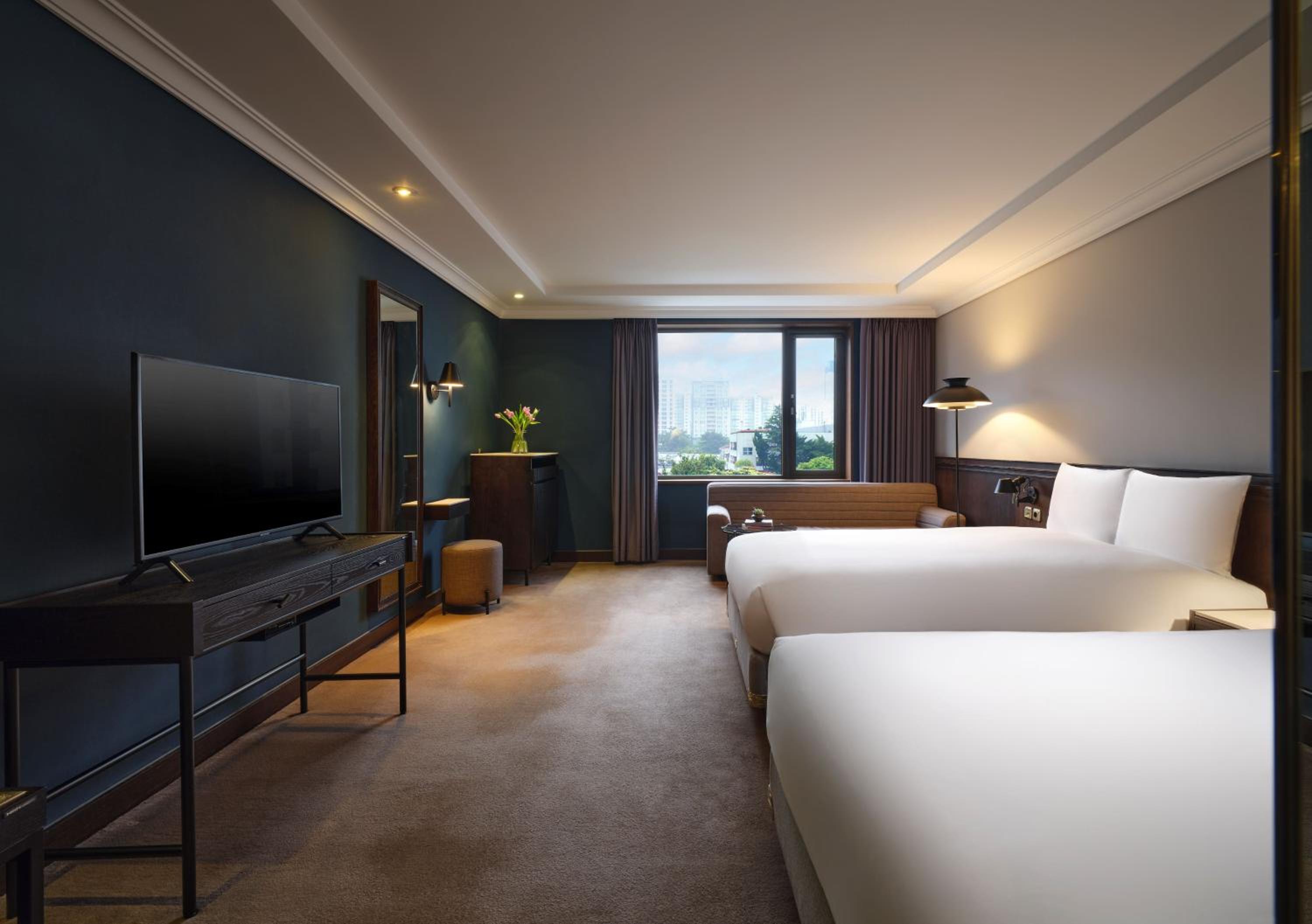 Premium Family Twin Room (Randomly Assigned Shower Booth or Bathtub)