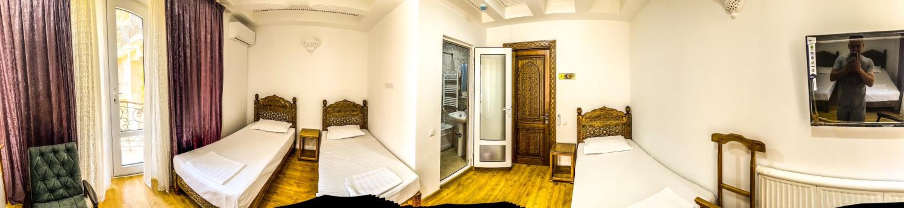 Triple Room with Private Bathroom photo 2