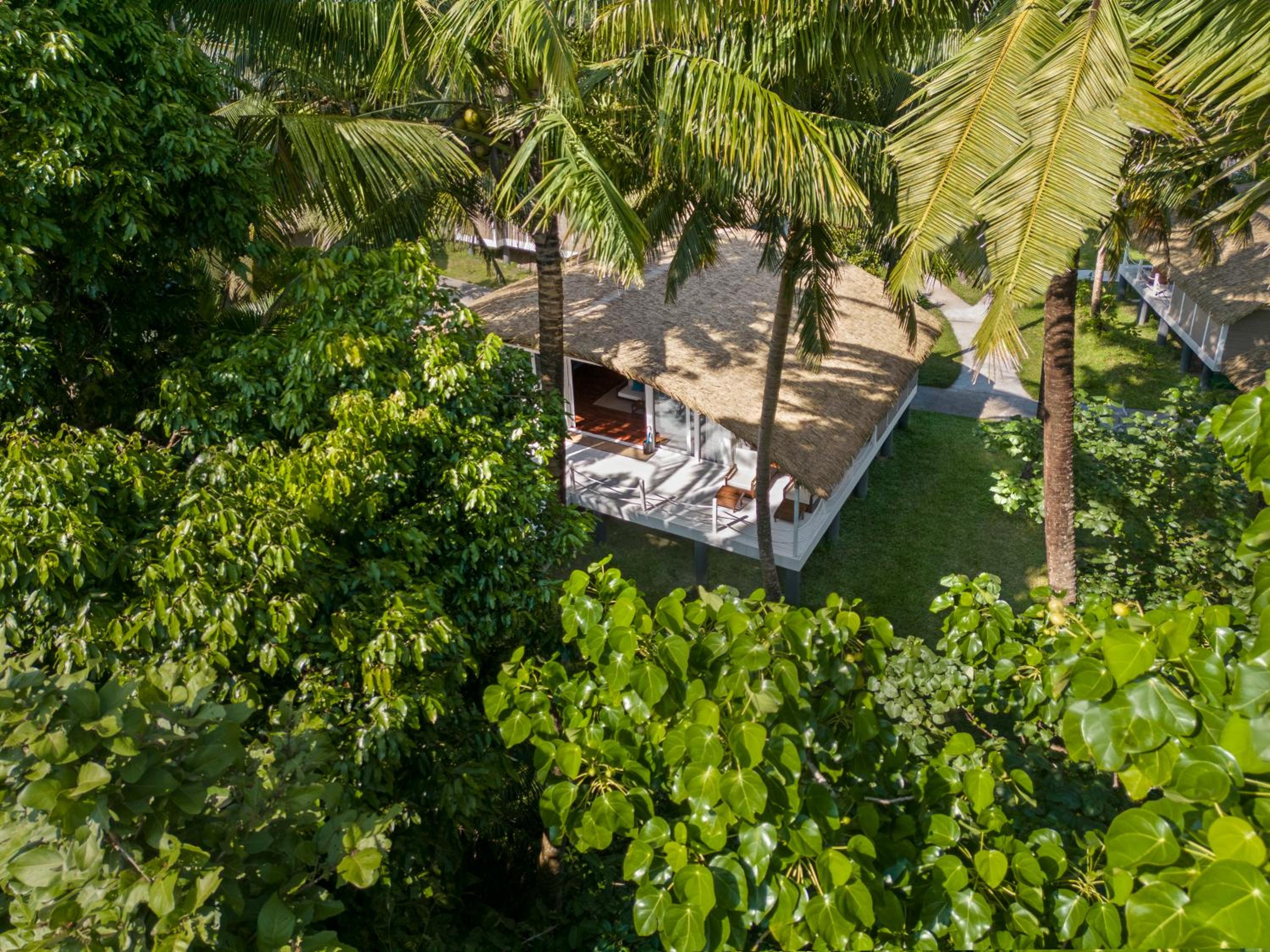 Deluxe Villa – Mangrove Facing – Inclusive Resort Activities: – Beachfront yoga session. – Aqua aerobics gym session. – Shell art activity – 10% Discount on SPA & Food & Soft Beverages & Laundry photo
