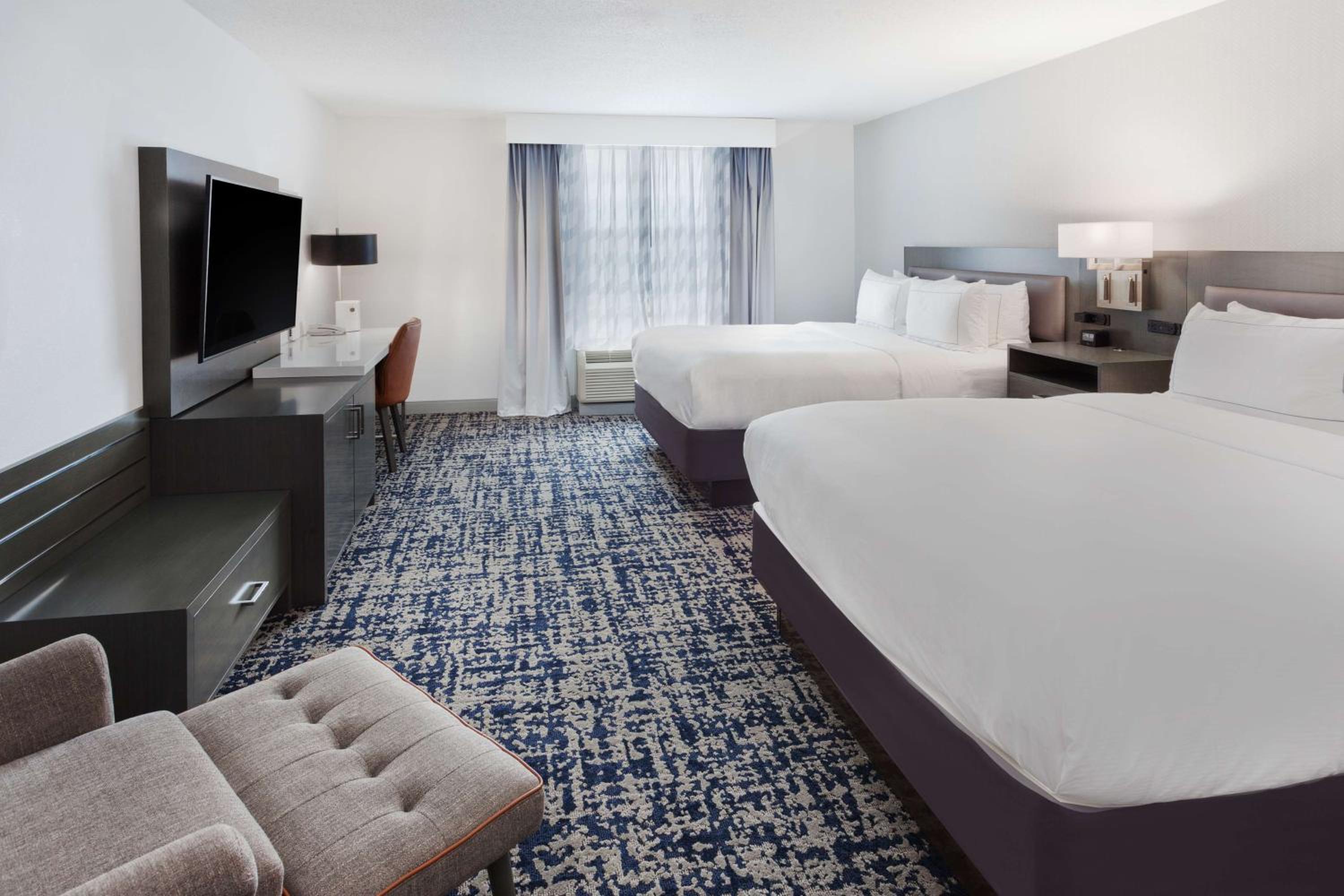 Queen Room with Two Queen Beds - Photo 1