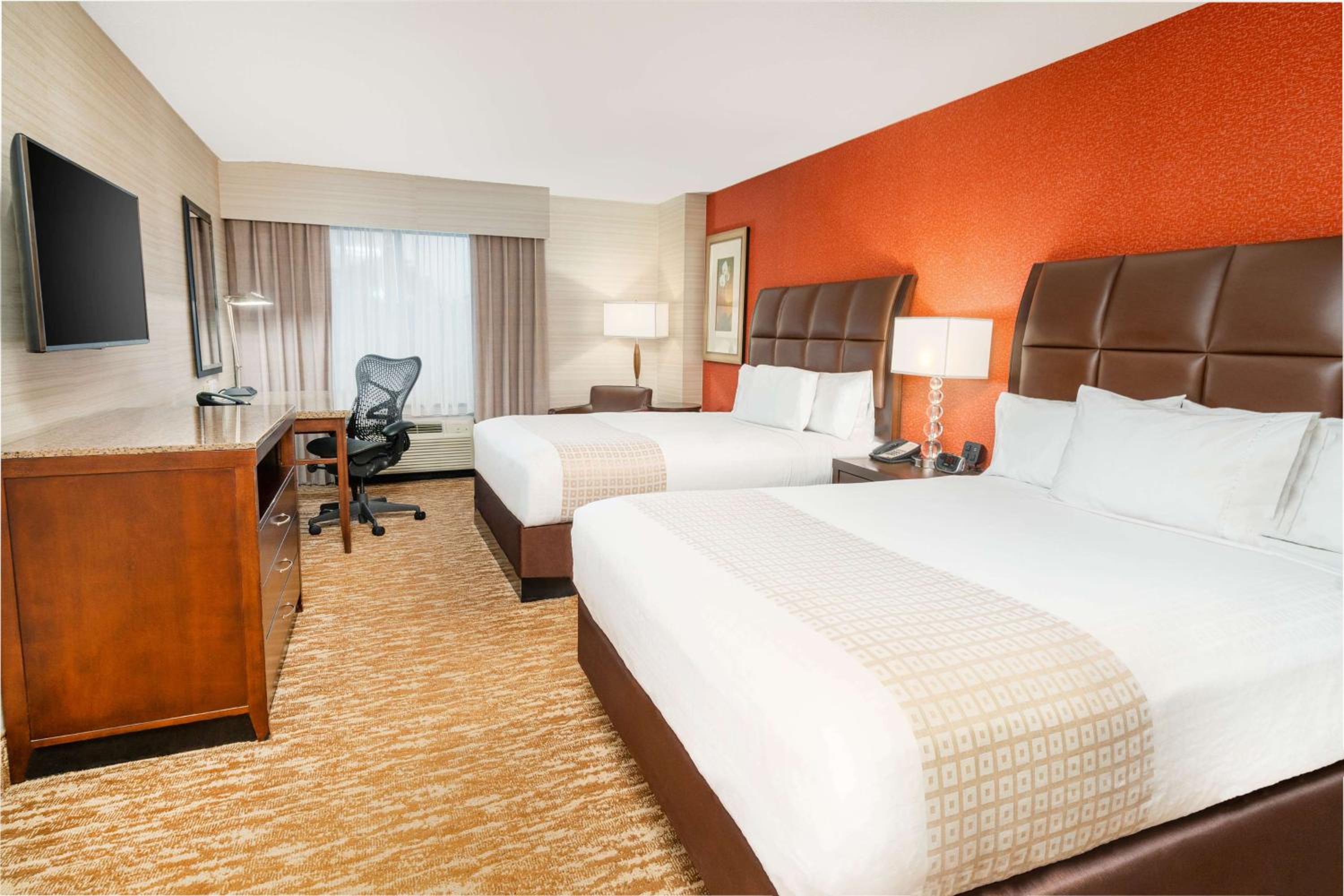 Queen Room with Two Queen Beds - Photo 1