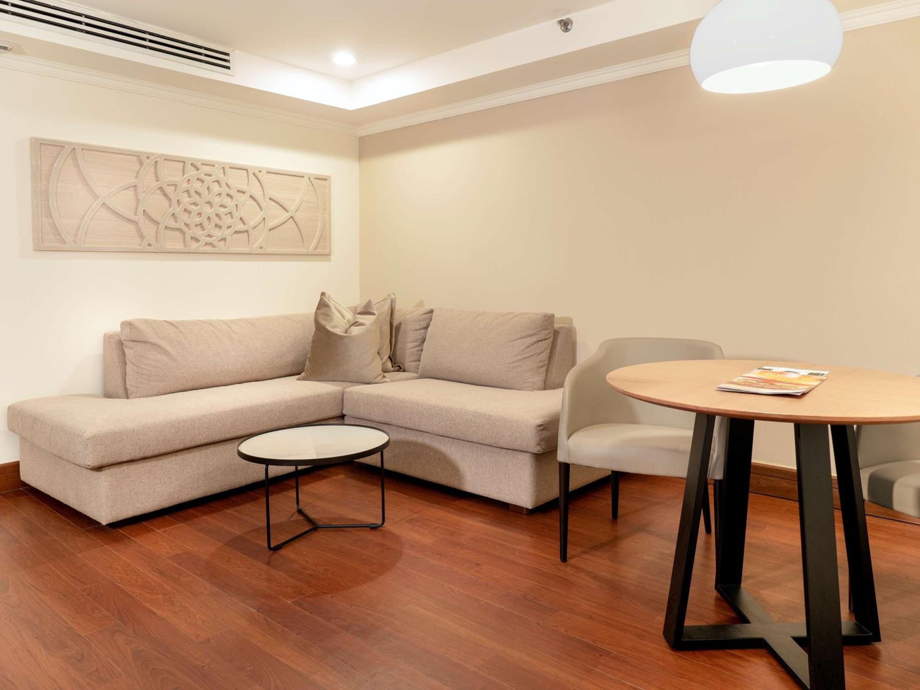 Junior King Suite with Seating Area - Photo 17