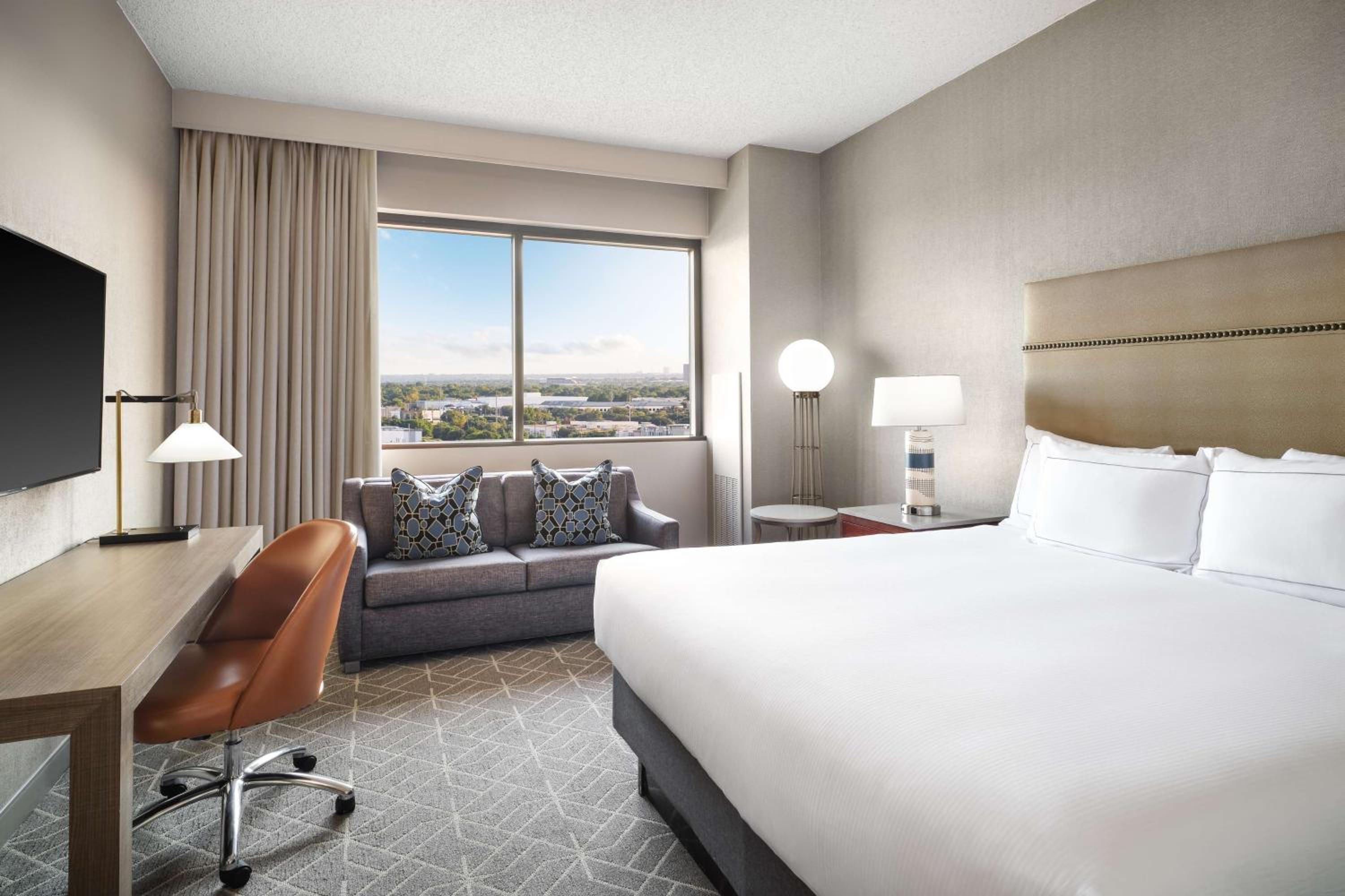King Room with Sofa Bed and City View - Photo 1