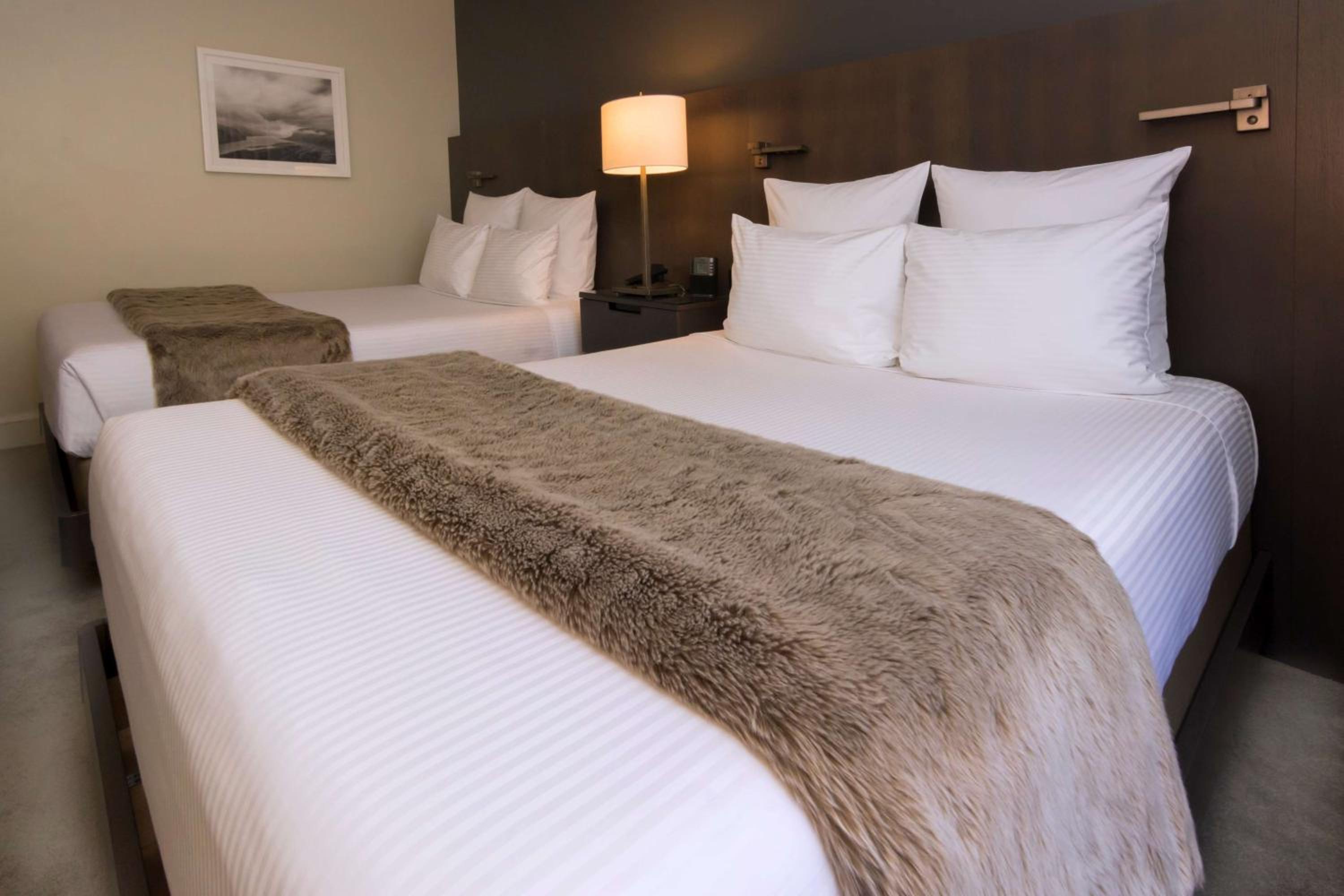 Premium Queen Room with Two Queen Beds - Photo 1