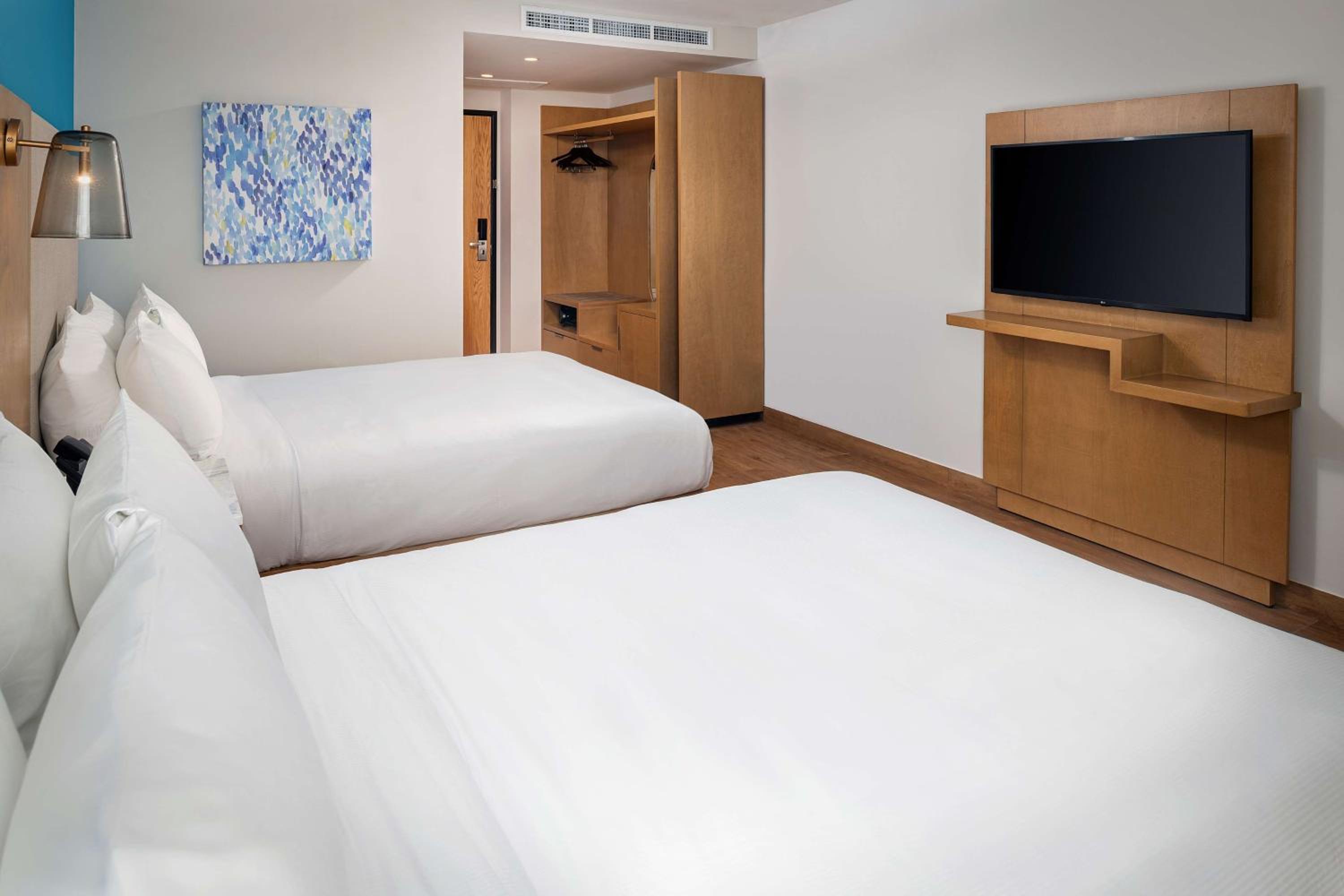 Queen Room with Two Queen Beds - Photo 1