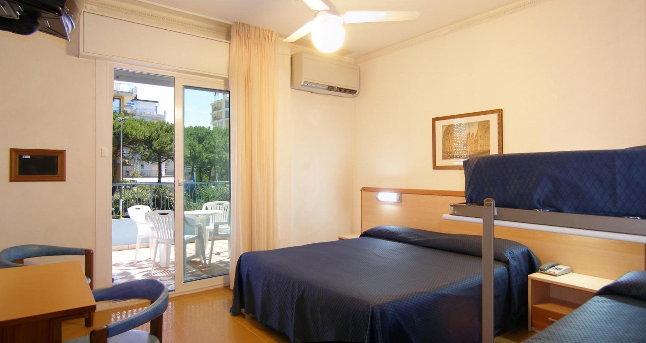 Quadruple Room with Balcony - Photo 1