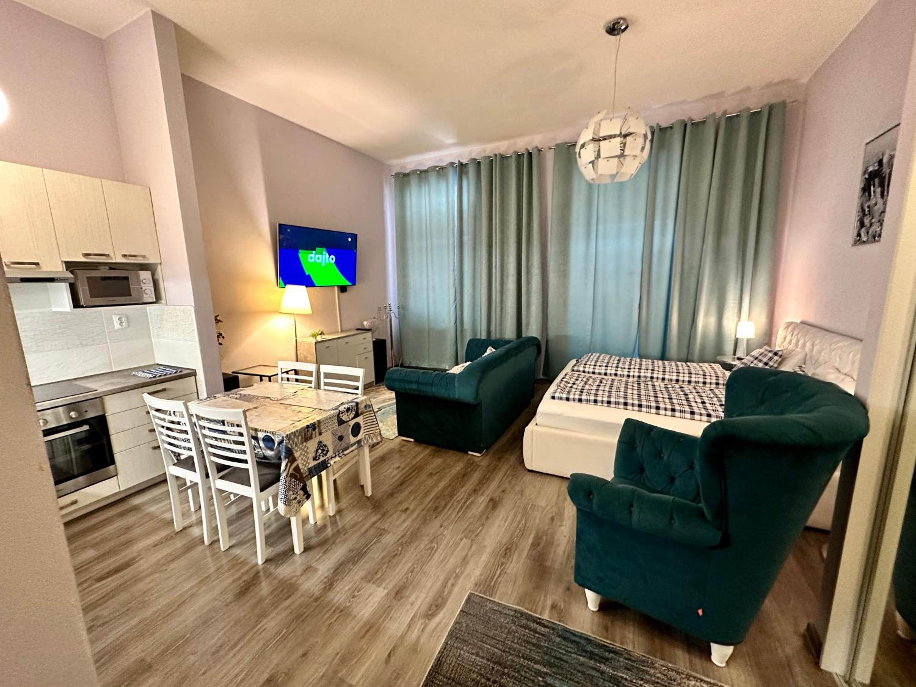 Apartment with Balcony - Photo 13