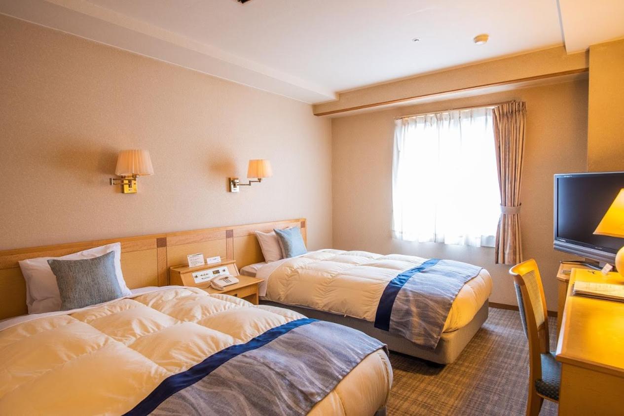 Twin Room - Photo 1