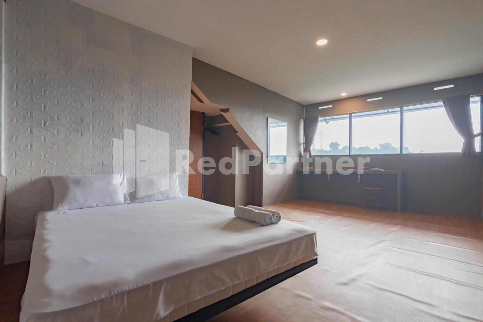 Deluxe Room - Photo 2