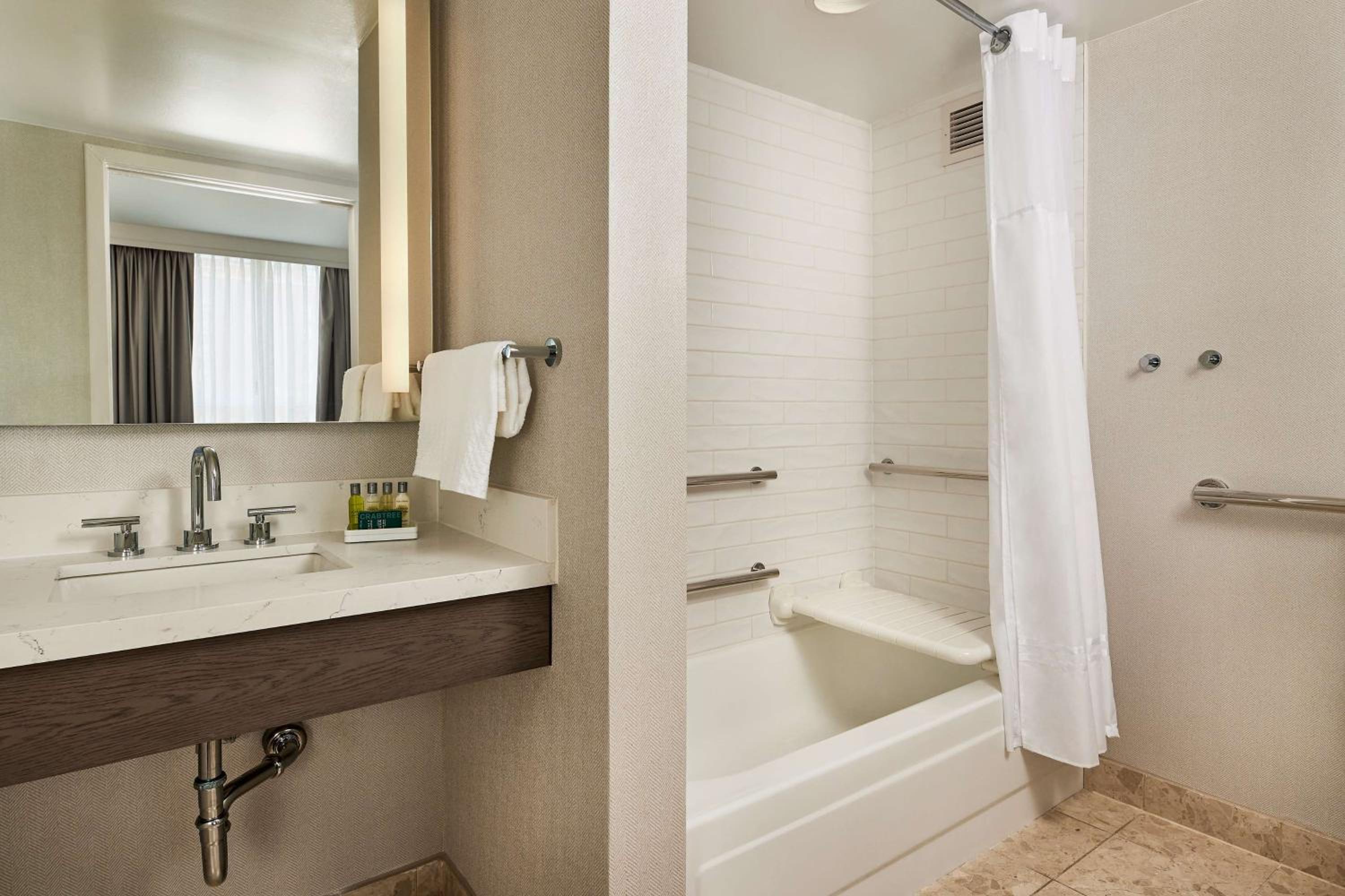Two-Room Queen Suite with 1 Queen Bed and Bath Tub - Mobility Accessible - Photo 2