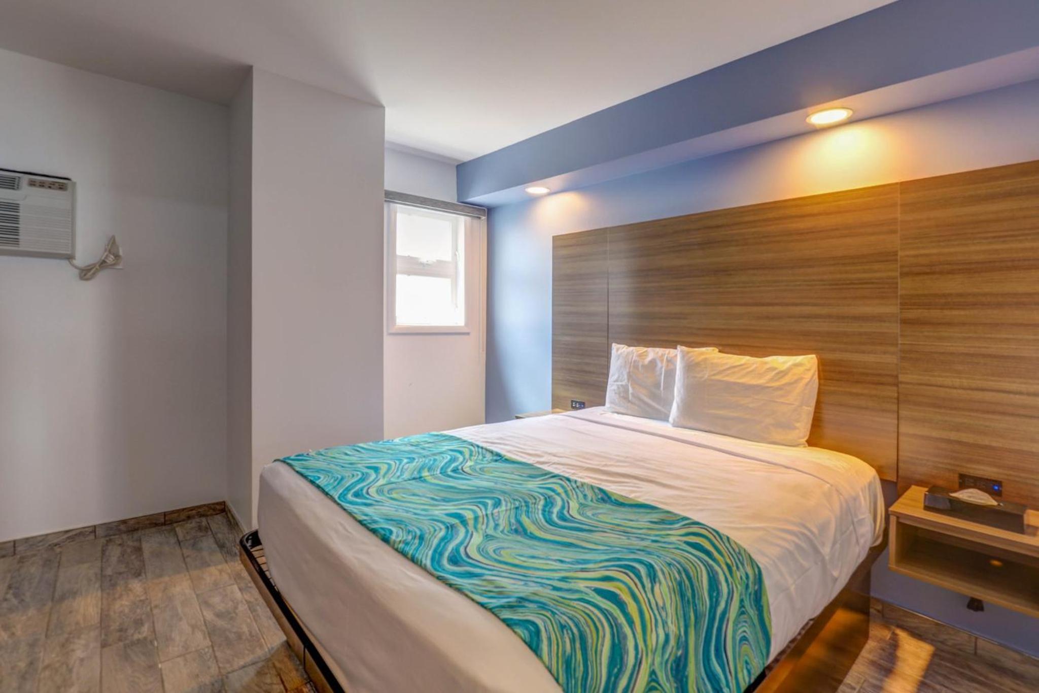 Two Room Suite with One King Bed, One Queen Bed Smoke Free photo 1