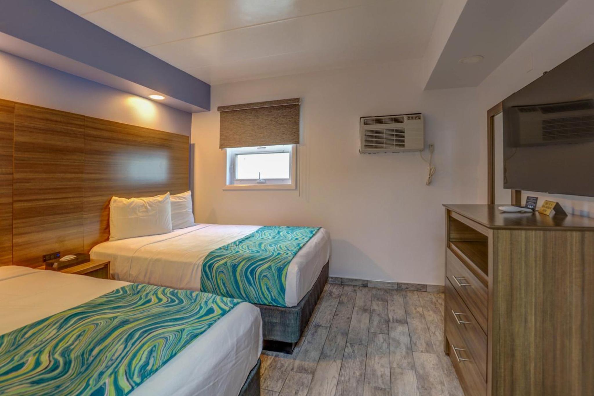 Efficiency Suite with One Full, One Twin Bed with Kitchenette Smoke Free photo 1