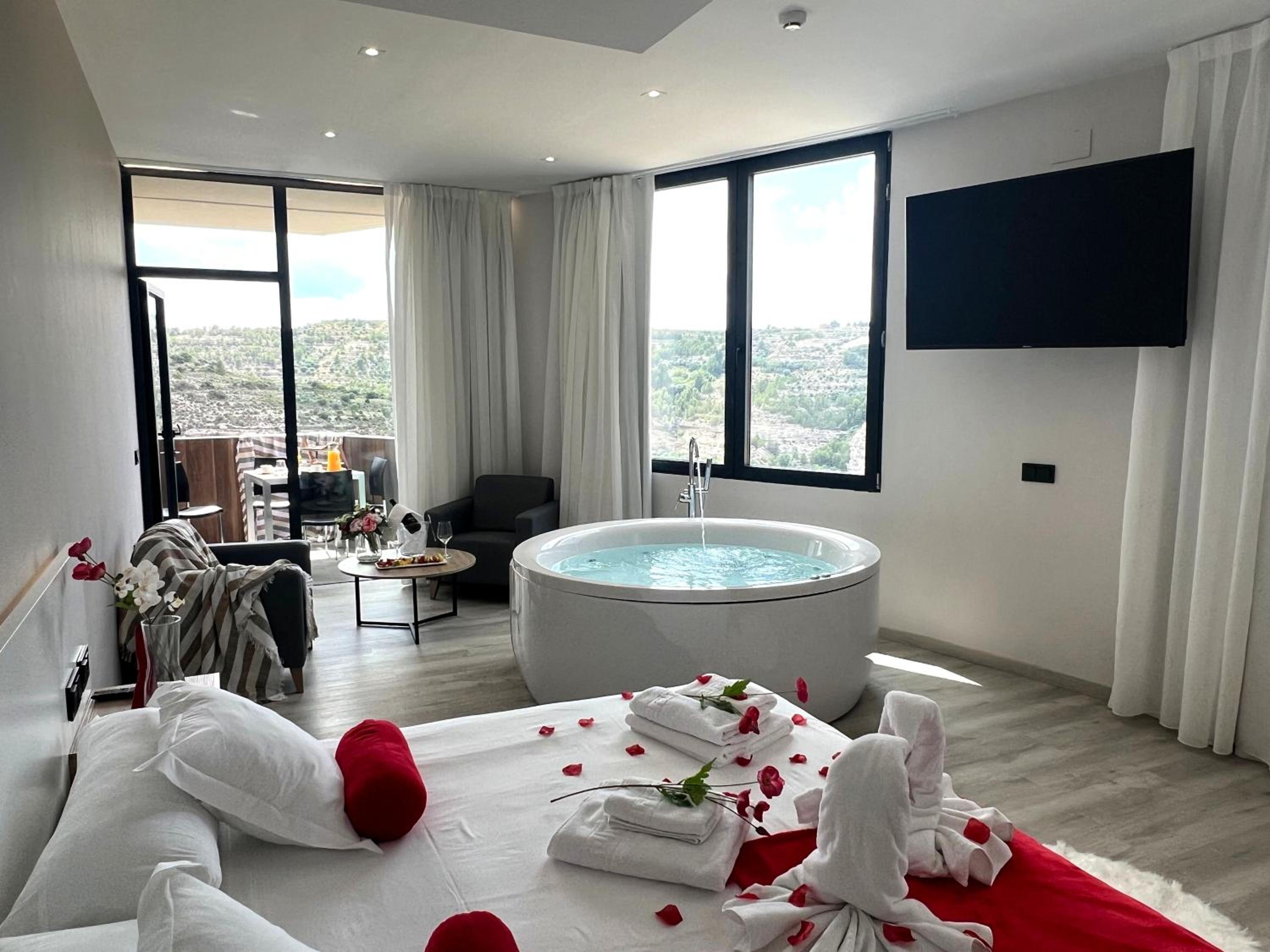 Suite Deluxe con Bañera de Hidromasaje Suite Deluxe con Bañera de Hidromasaje