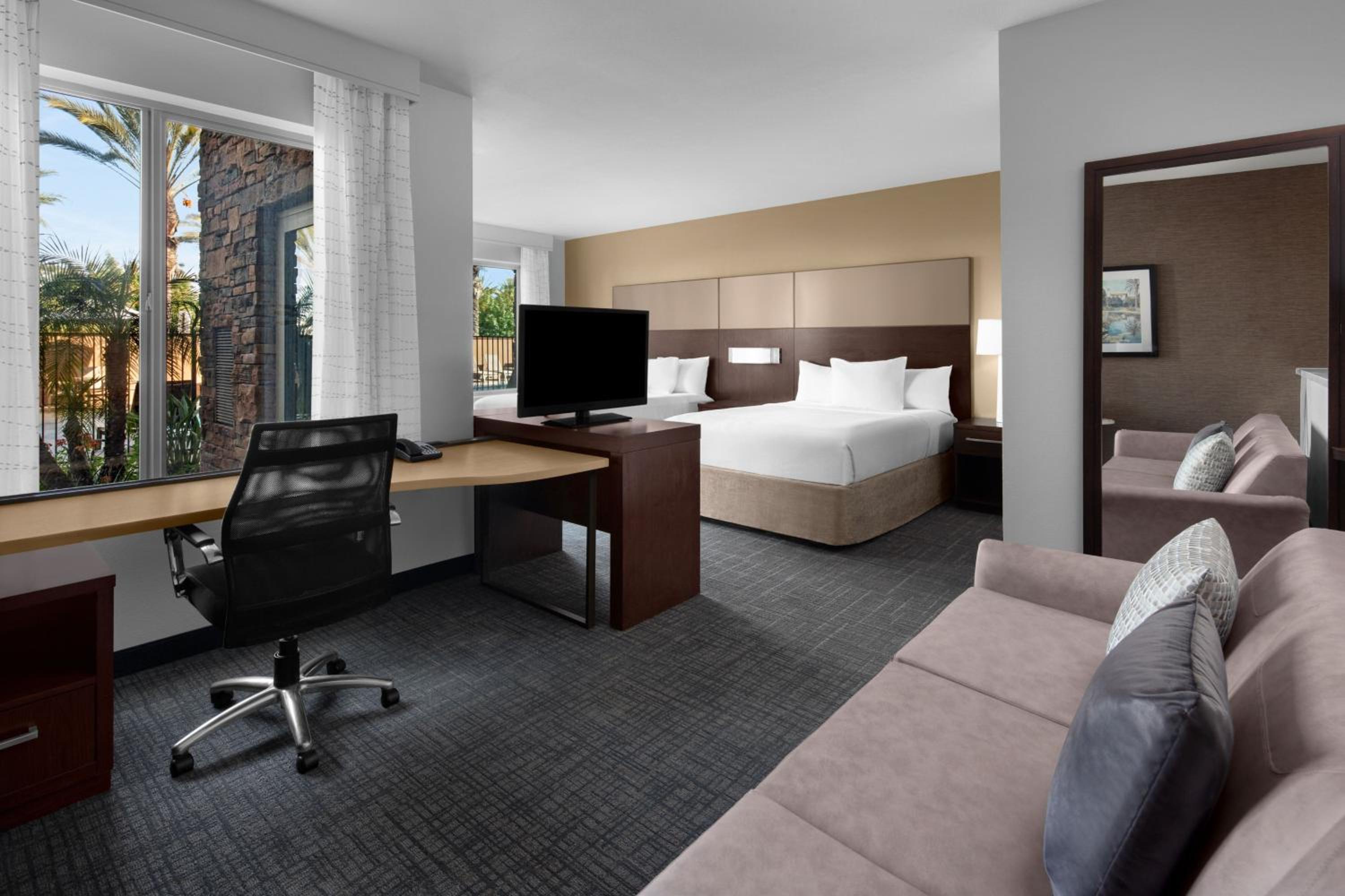 Queen Room with Two Queen Beds Poolside and Patio View - Club Lounge Access photo 1