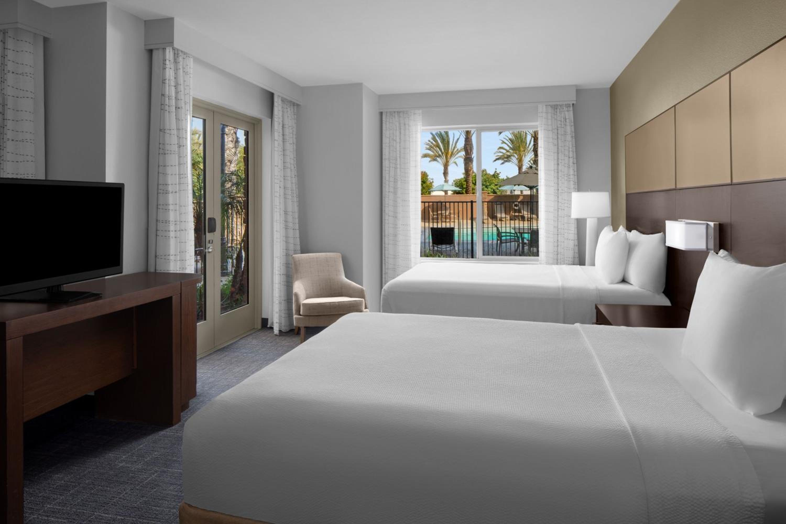 Queen Room with Two Queen Beds Poolside and Patio View - Club Lounge Access photo 3