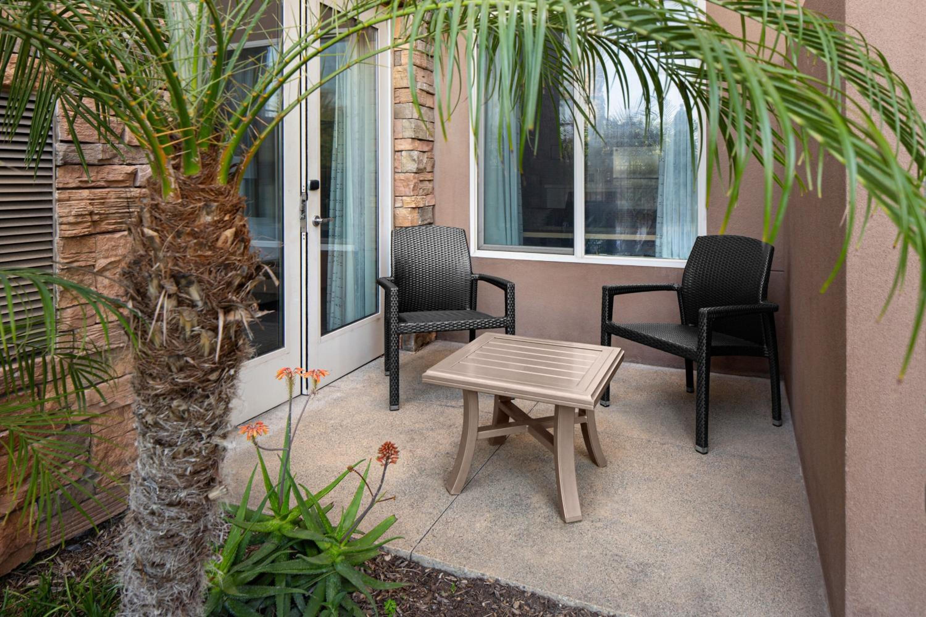 Queen Room with Two Queen Beds Poolside and Patio View - Club Lounge Access photo 2