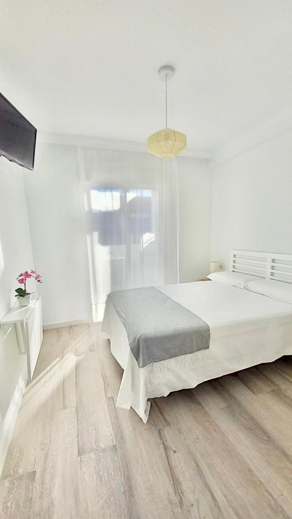 Habitación doble con baño compartido
