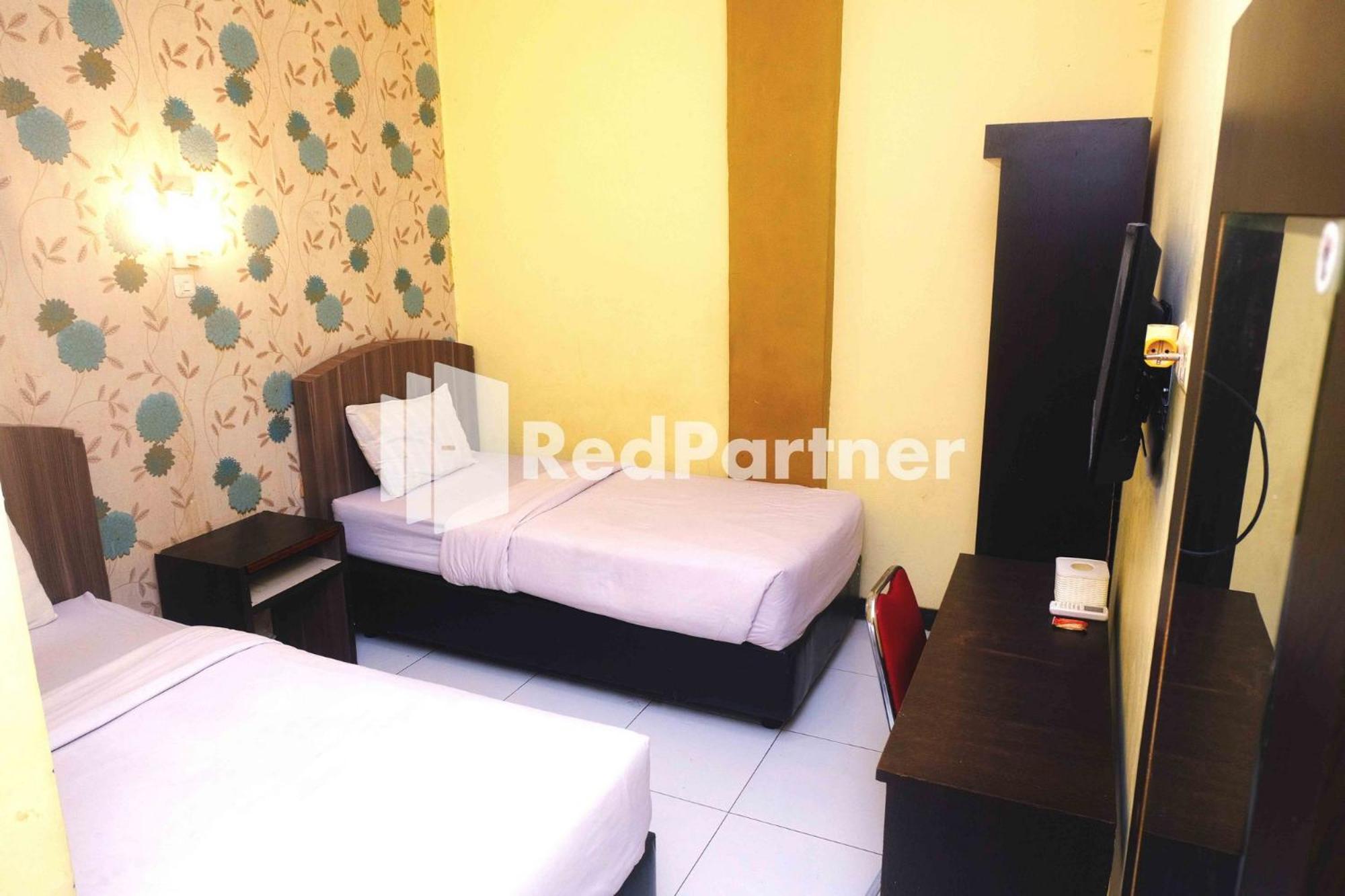 Twin Room - Photo 12