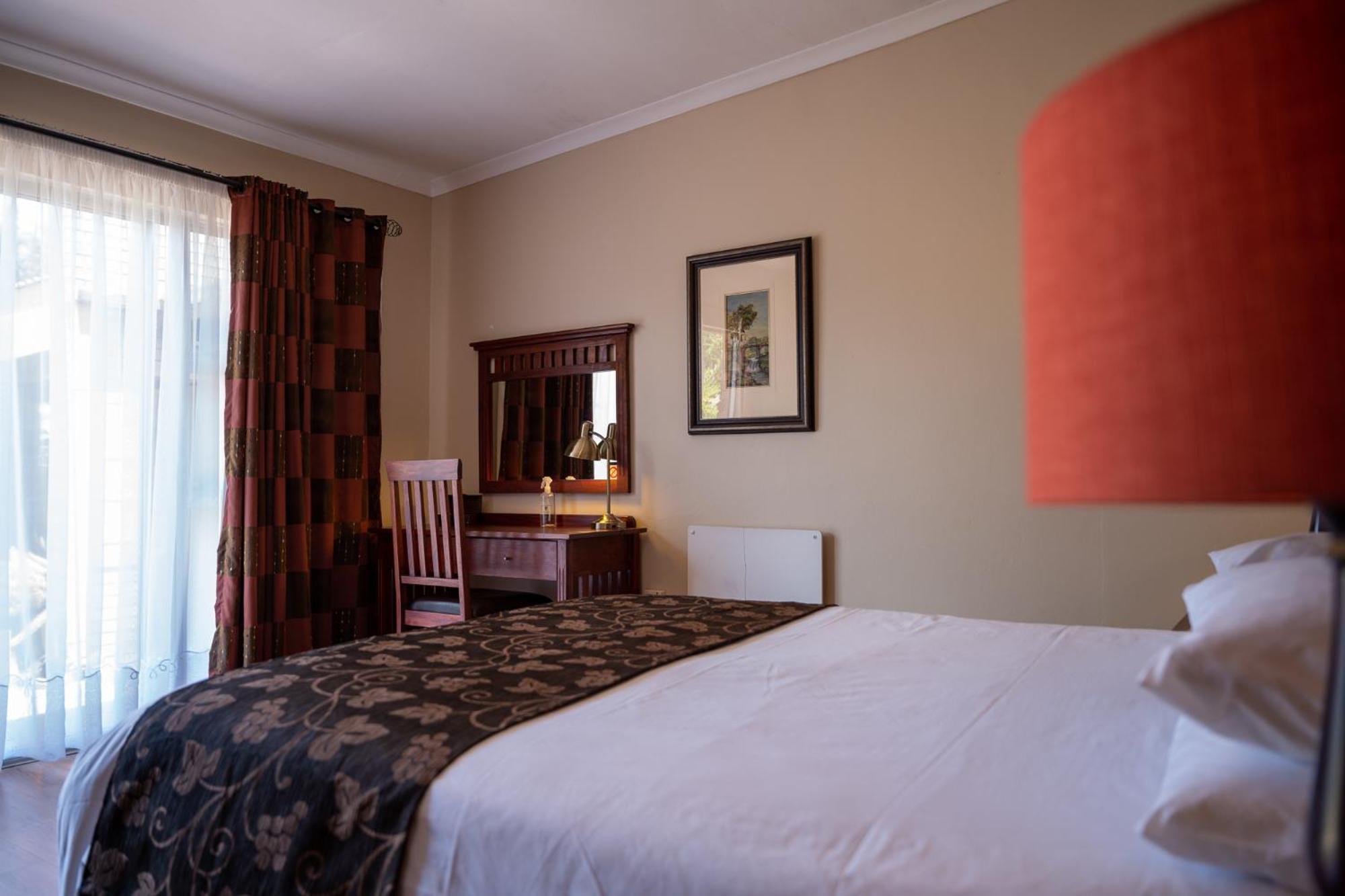 Deluxe Double Room with Bath - Photo 1
