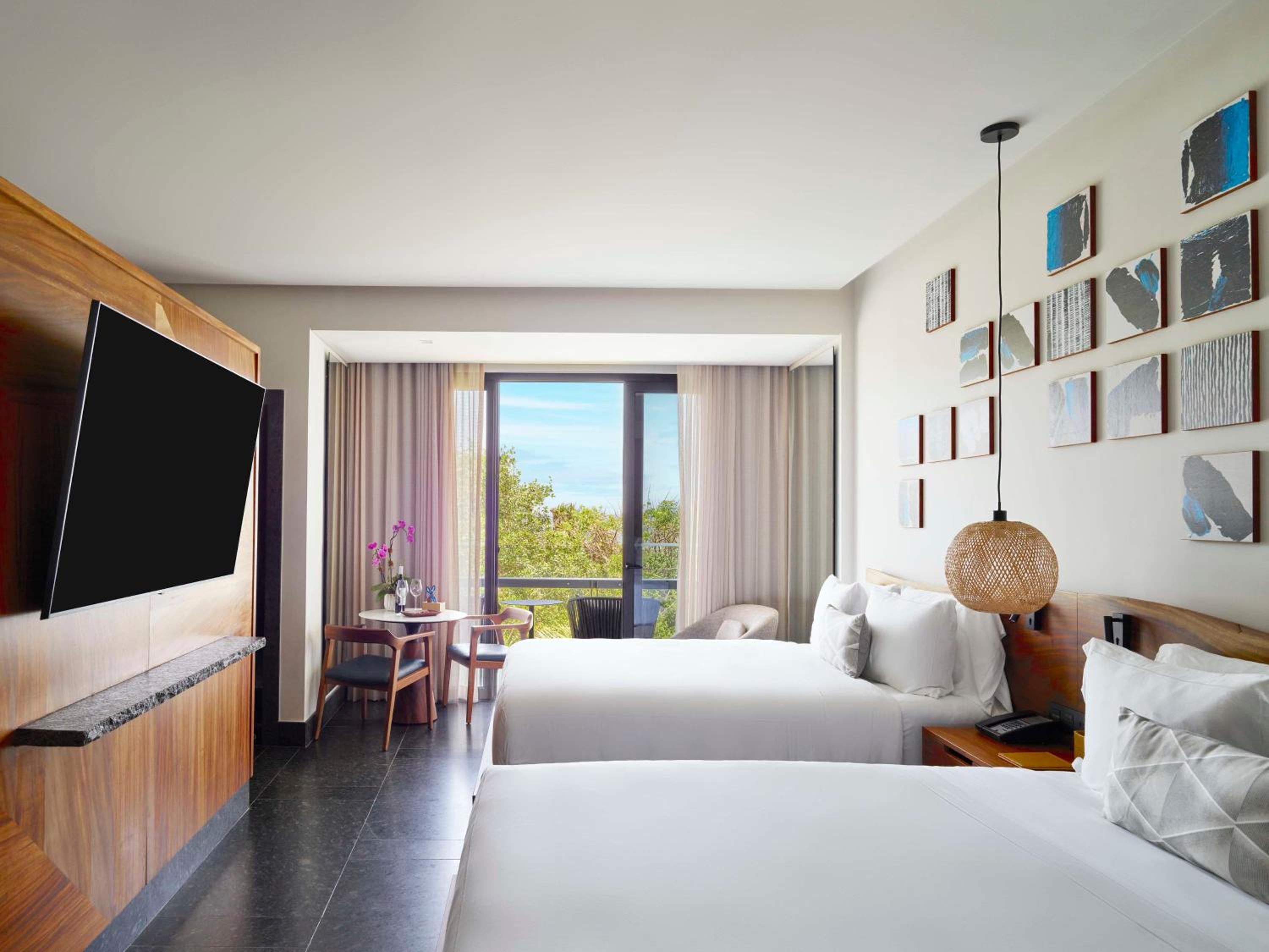 Queen Room with Two Queen Beds and Partial Ocean View - Photo 1