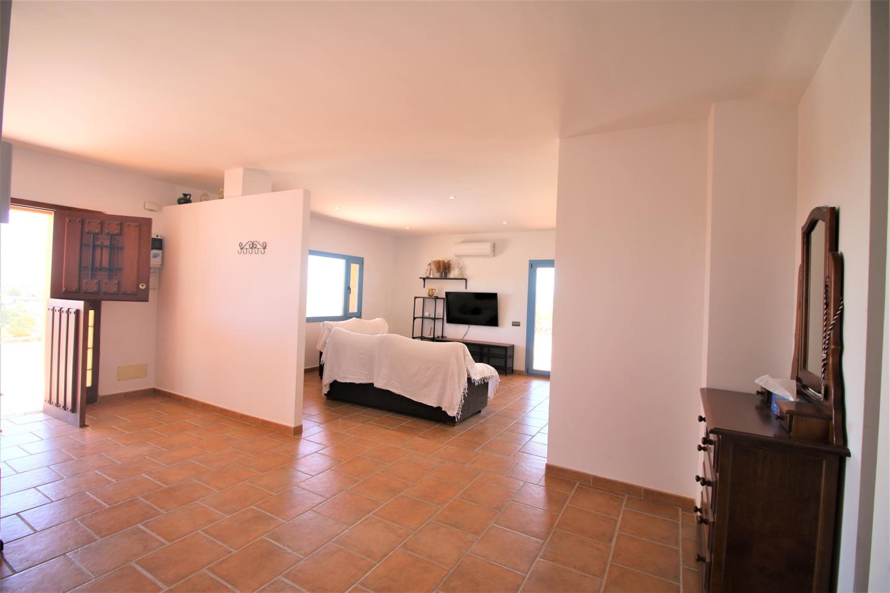 Casa de cuatro habitaciones