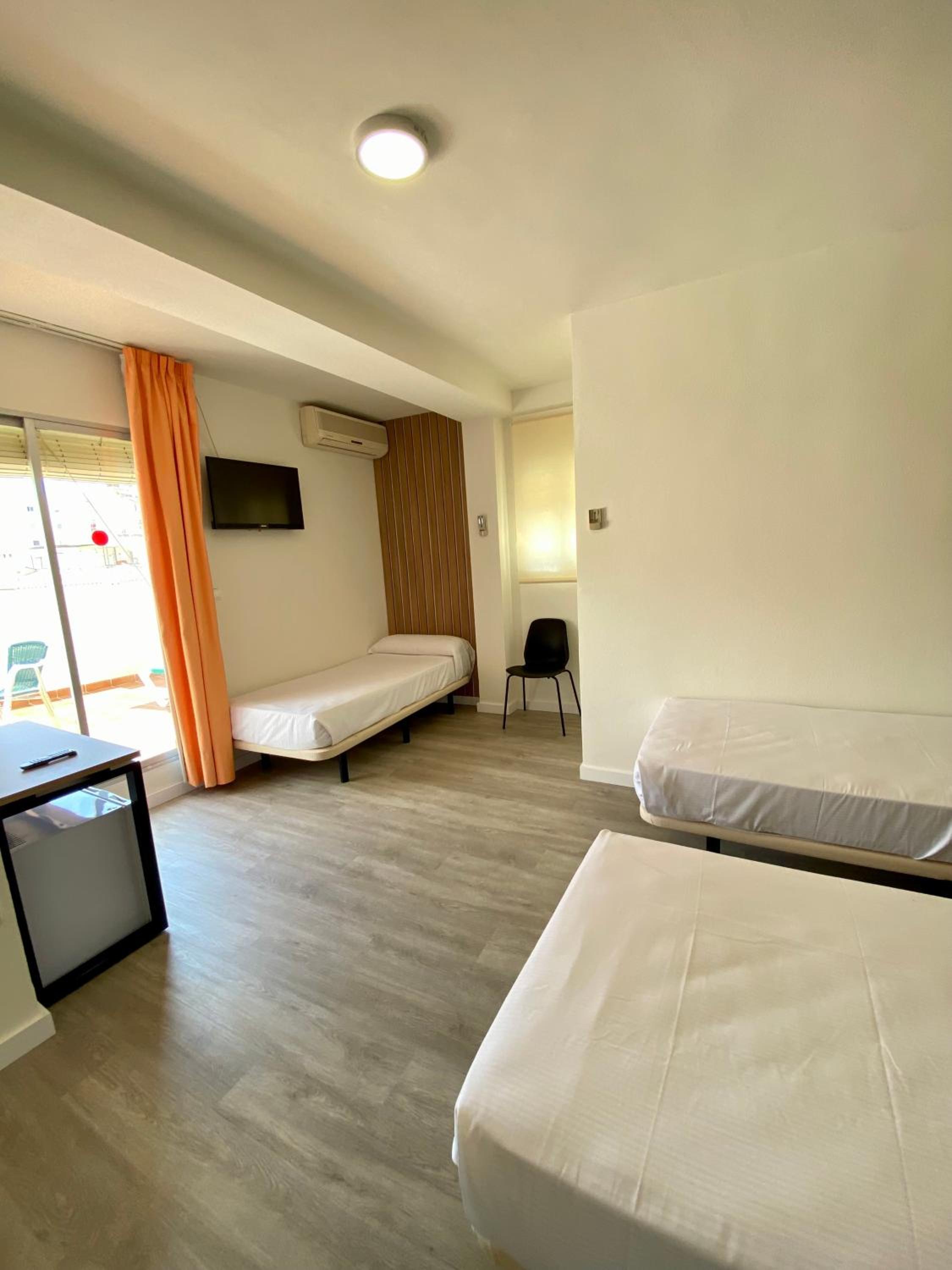 Habitación triple con terraza